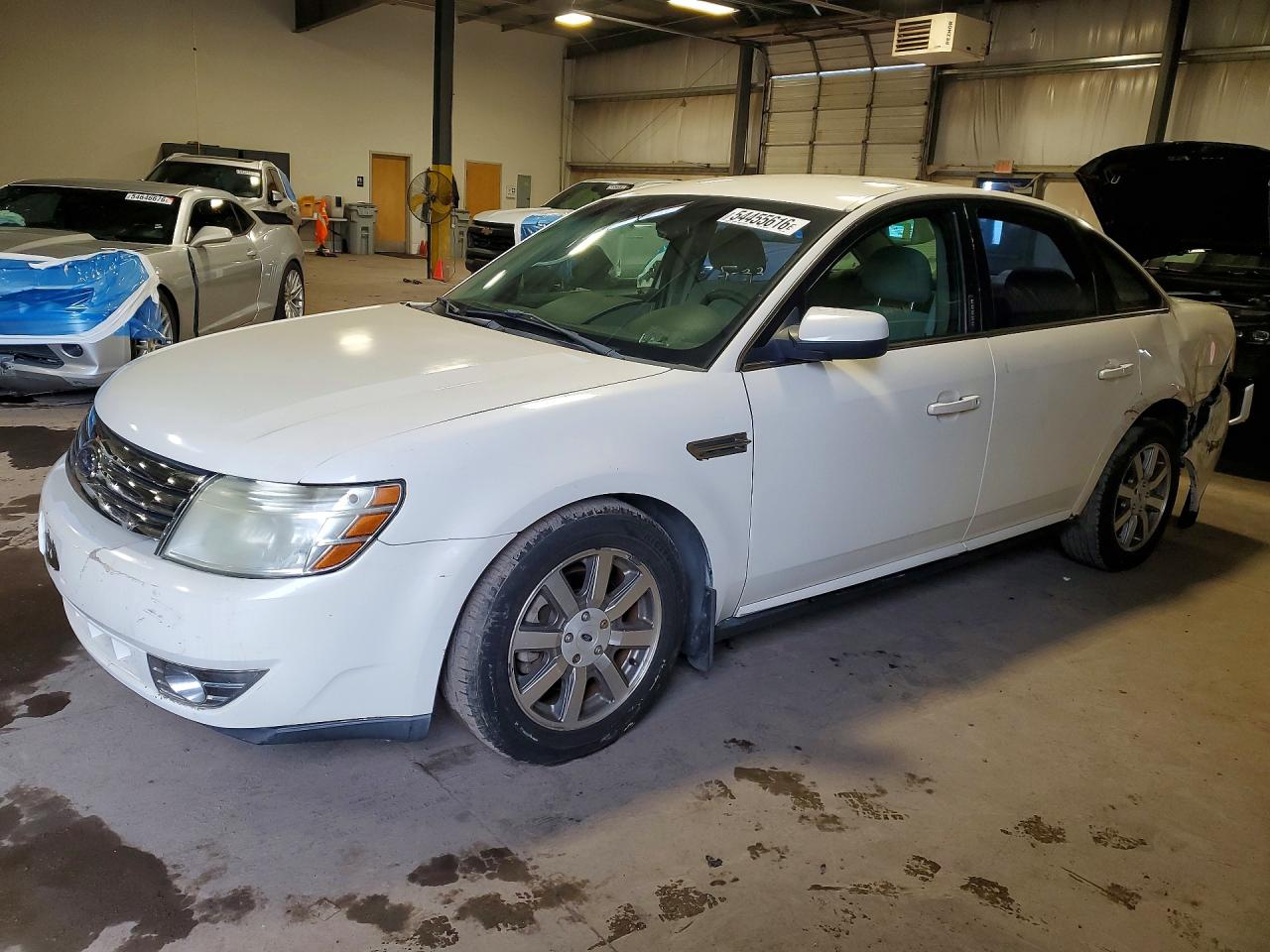 2009 Ford Taurus SEL, VIN 1FAHP27WX9G110021 — Rear end