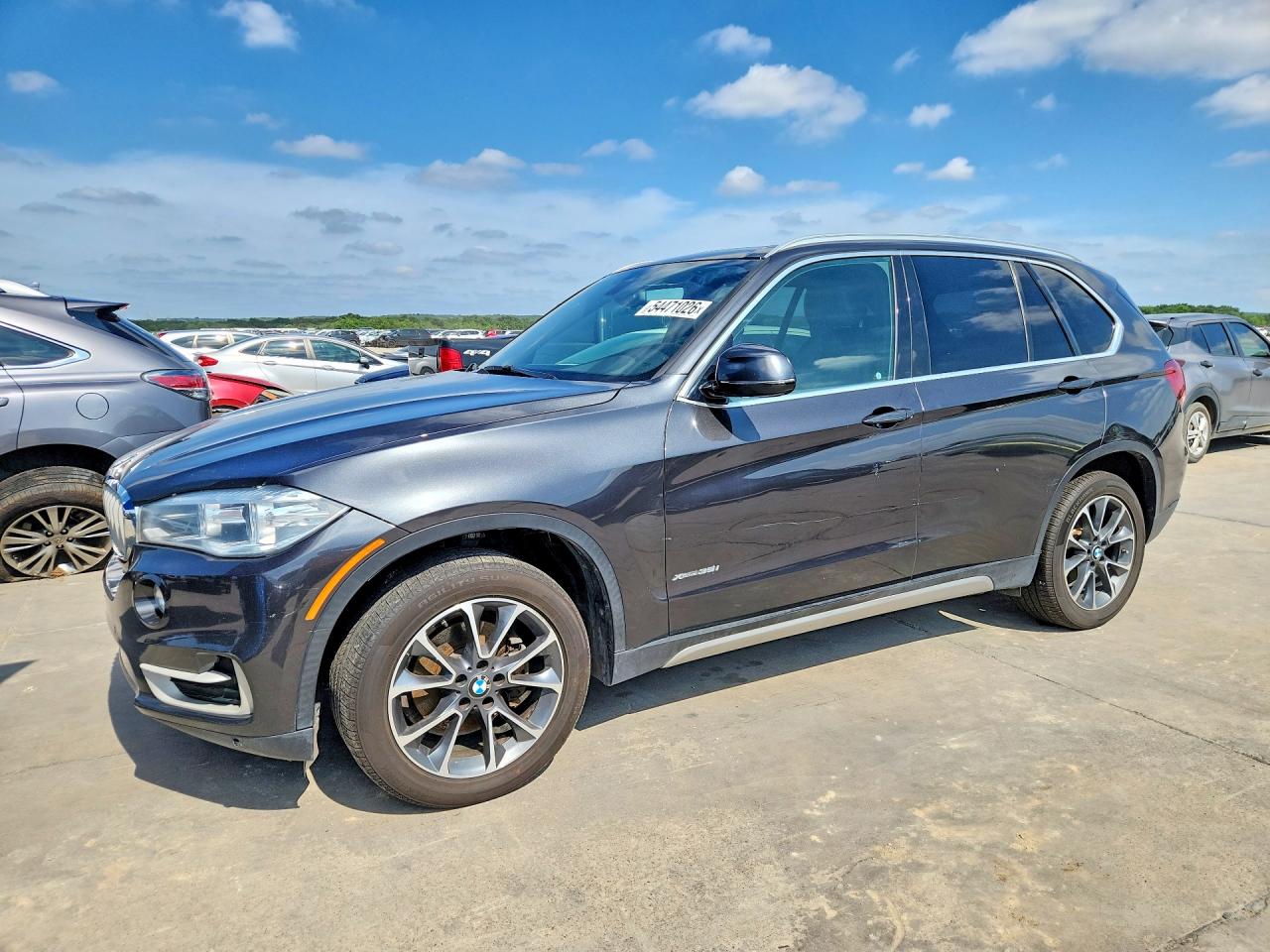 2018 BMW X5 xDrive35i, VIN 5UXKR0C54J0Y02637 — Hail