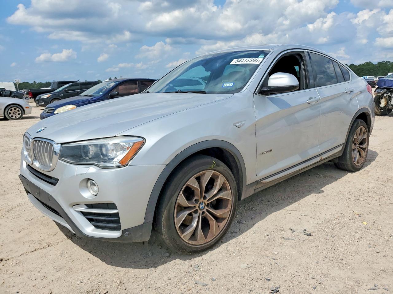 2018 BMW X4 xDrive28i, VIN 5UXXW3C58J0Y66101 — Зад