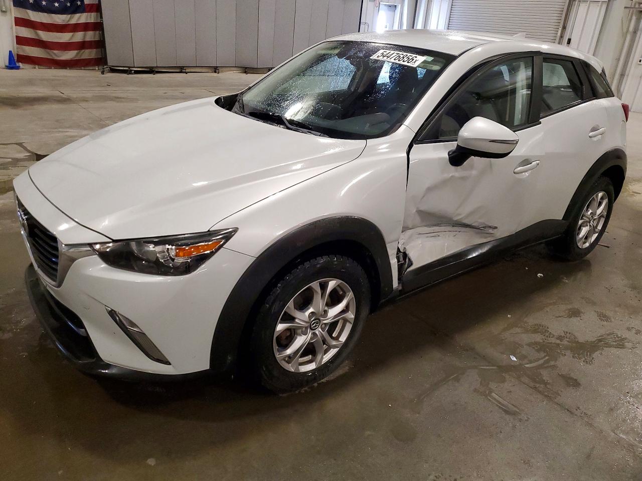 2017 Mazda CX-3 Touring, VIN JM1DKDC70H0144588 — Side