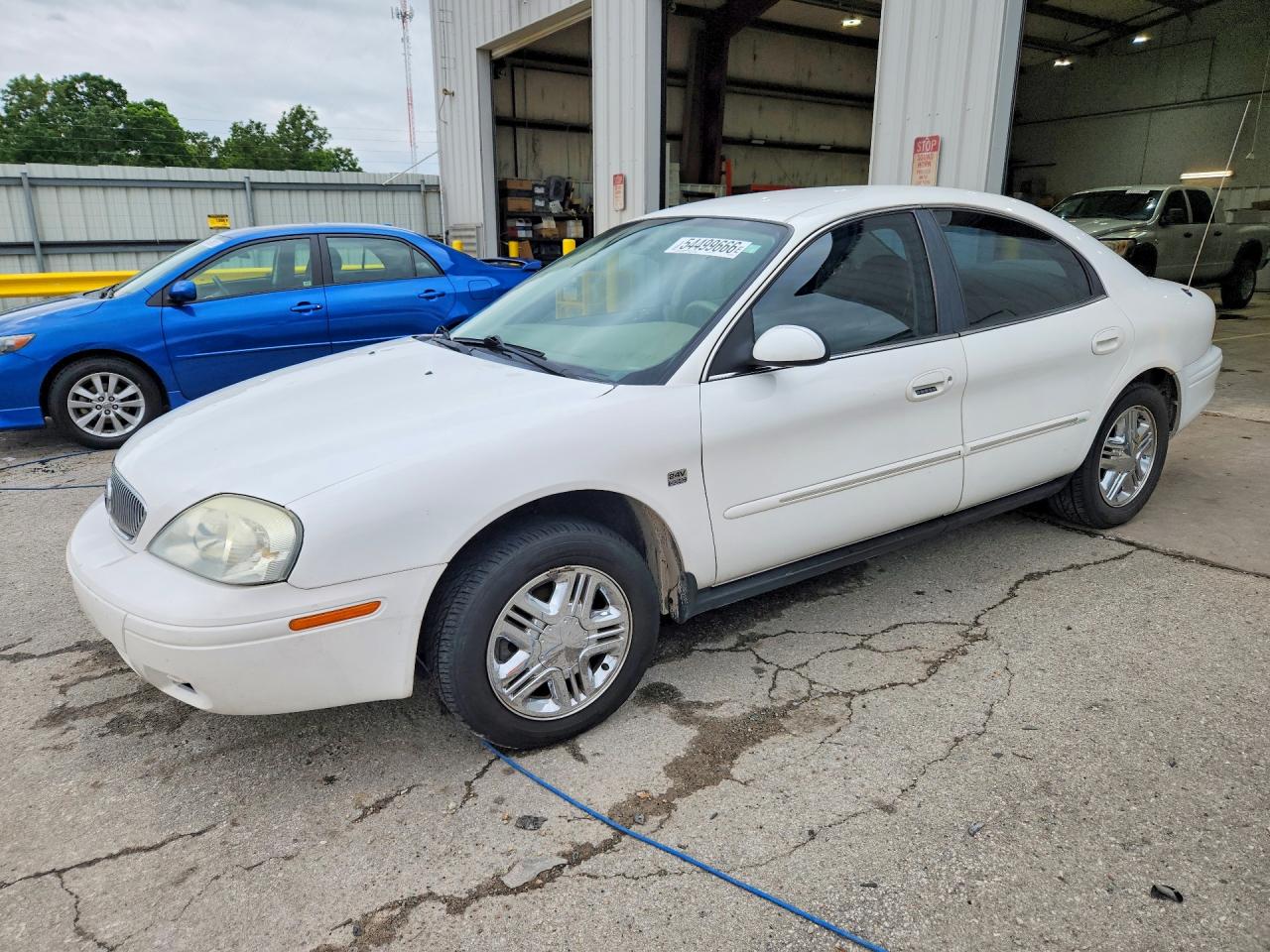 2004 Mercury Sable LS Premium, VIN 1MEHM55S74A607543 — Hail