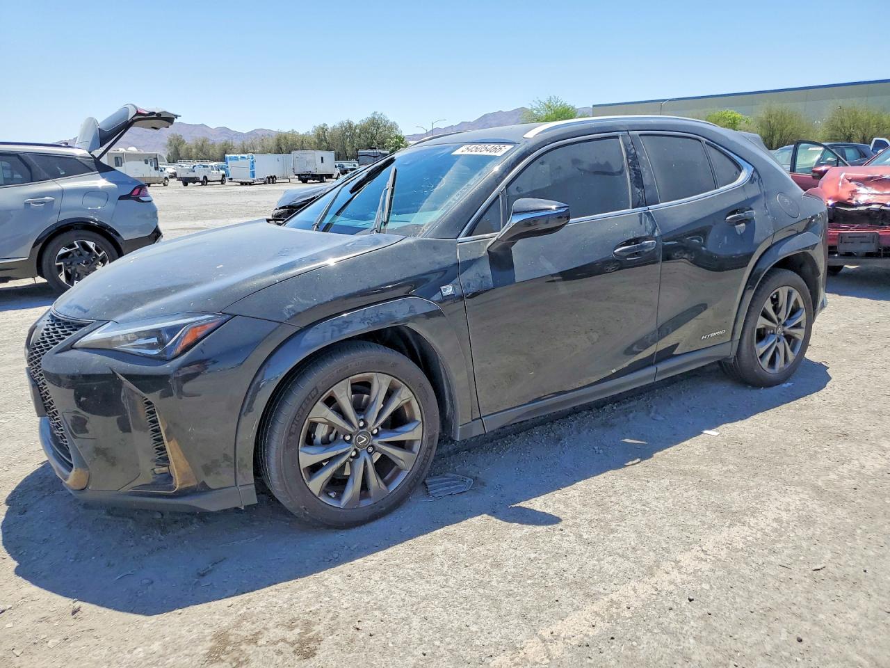 2022 Lexus UX 250h F Sport, VIN JTHE9JBHXN2057904 — Бок