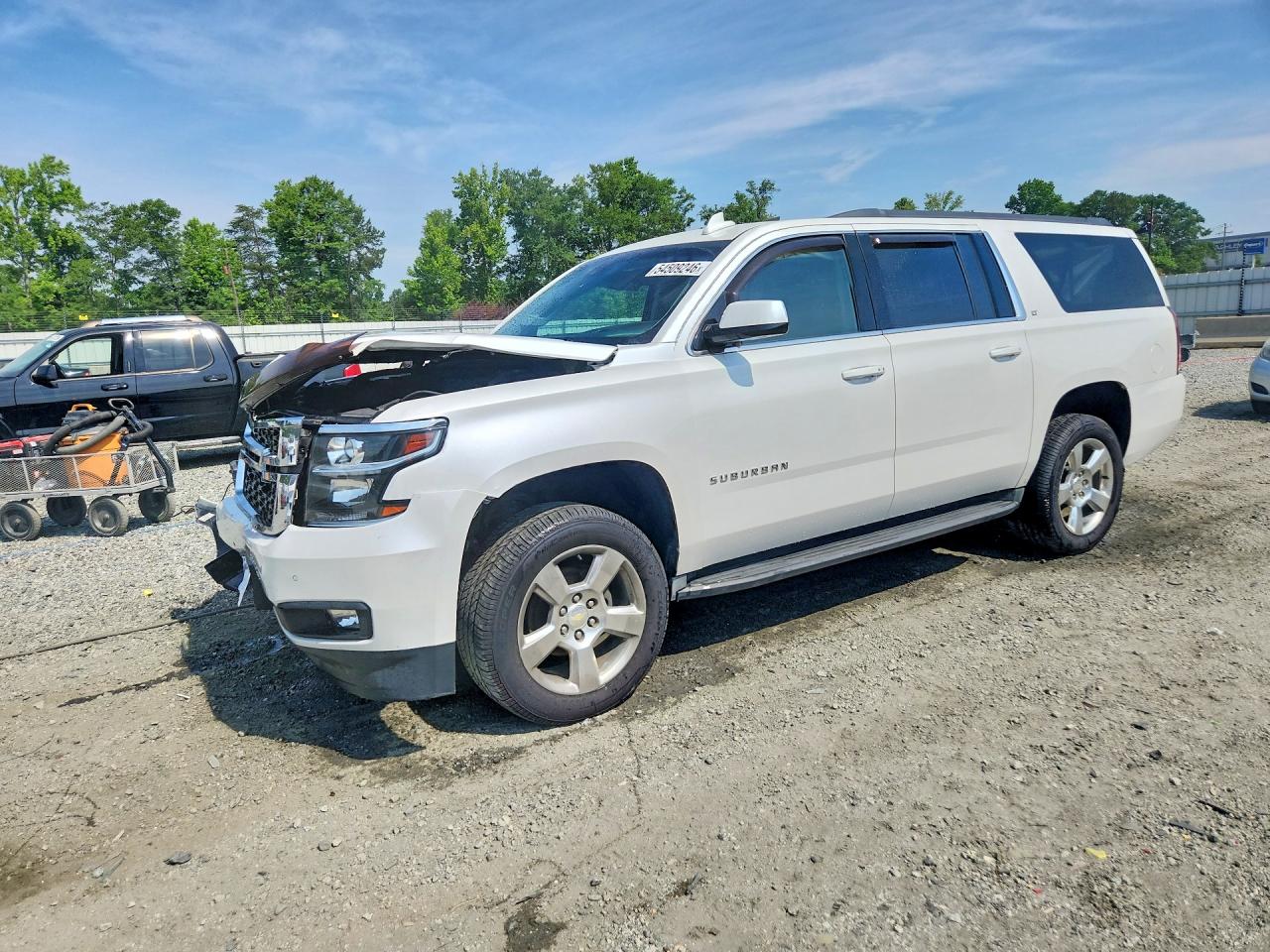 2016 Chevrolet Suburban LT, VIN 1GNSKHKC8GR145115 — Front end