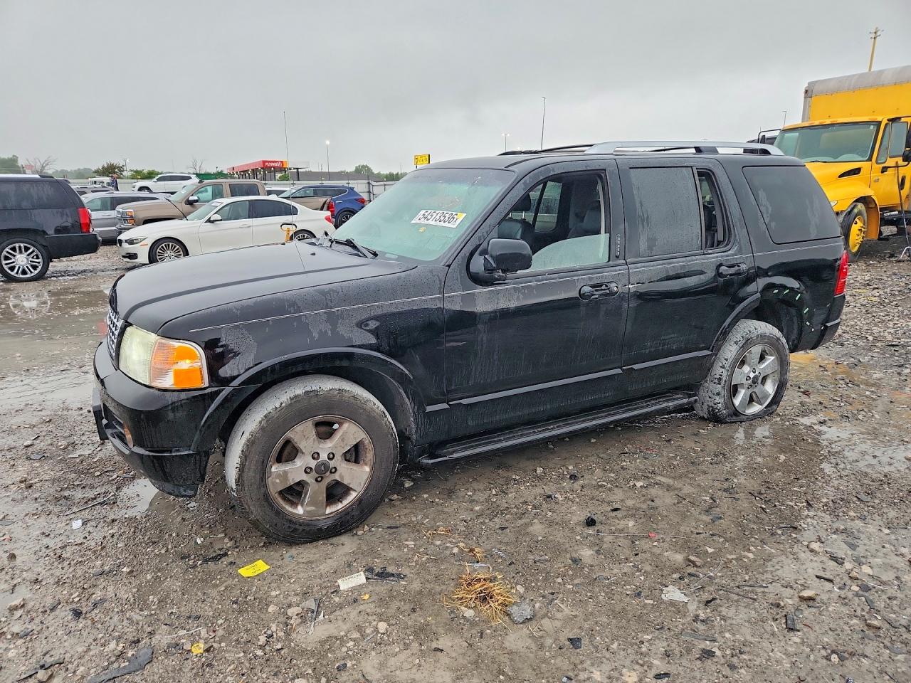 2003 Ford Explorer Limited, VIN 1FMDU85W53ZA48297 — Side