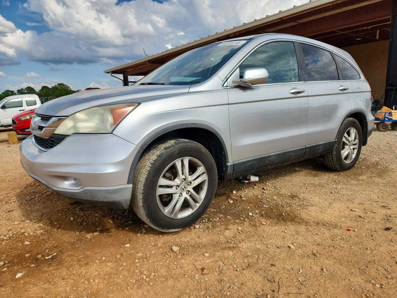 2010 Honda CR-V EX-L, VIN 5J6RE4H79AL006276 — Side