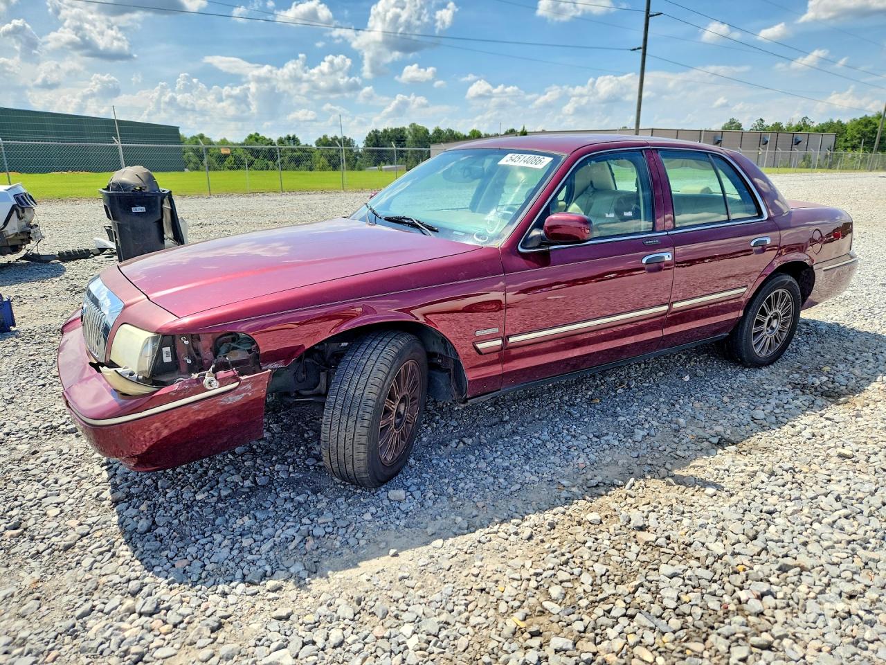 2011 Mercury Grand Marquis LS, VIN 2MEBM7FV9BX606313 — Front end
