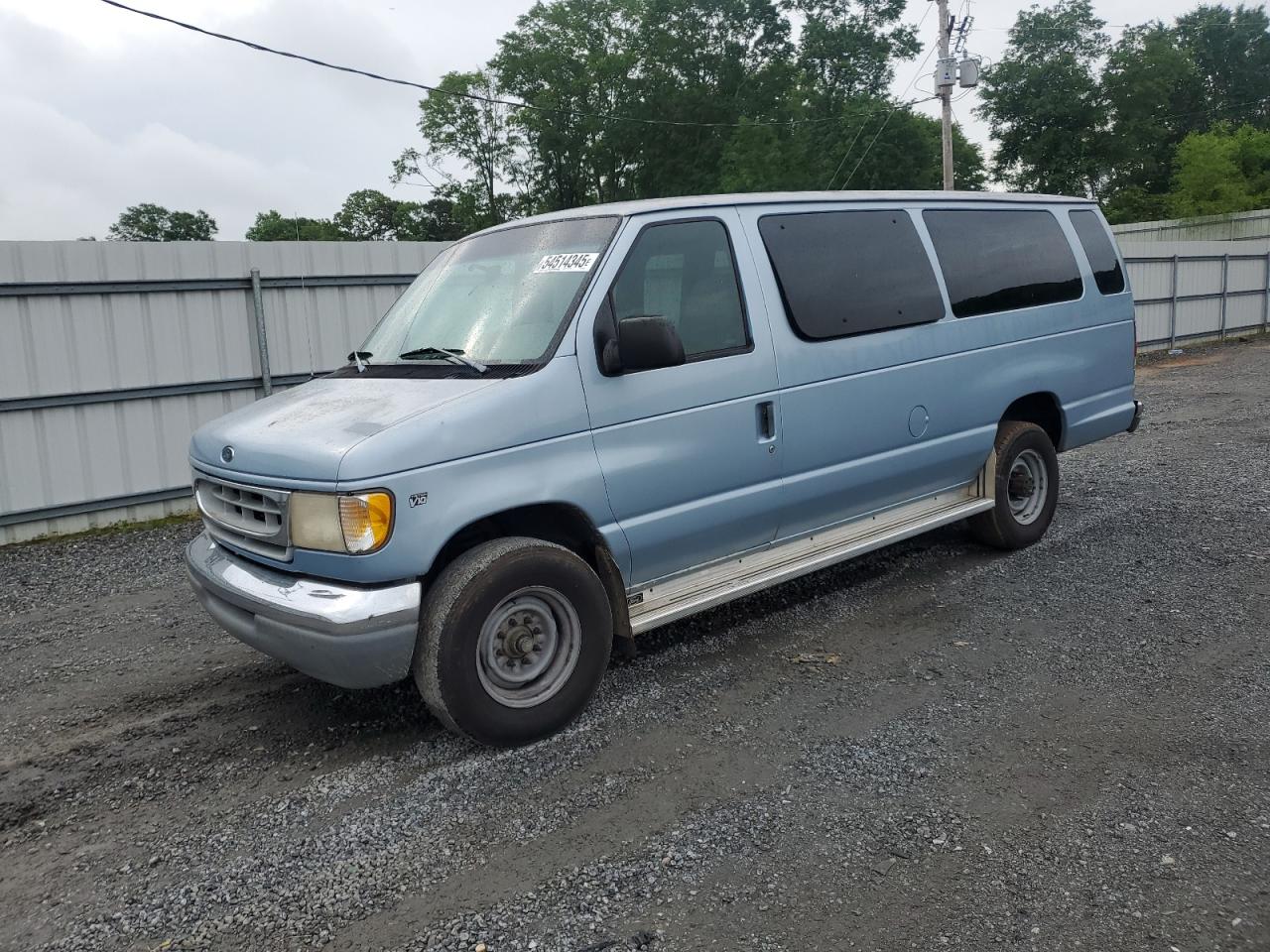 1998 Ford Econoline Wagon XL, VIN 1FBSS31SXWHB99545 — Side