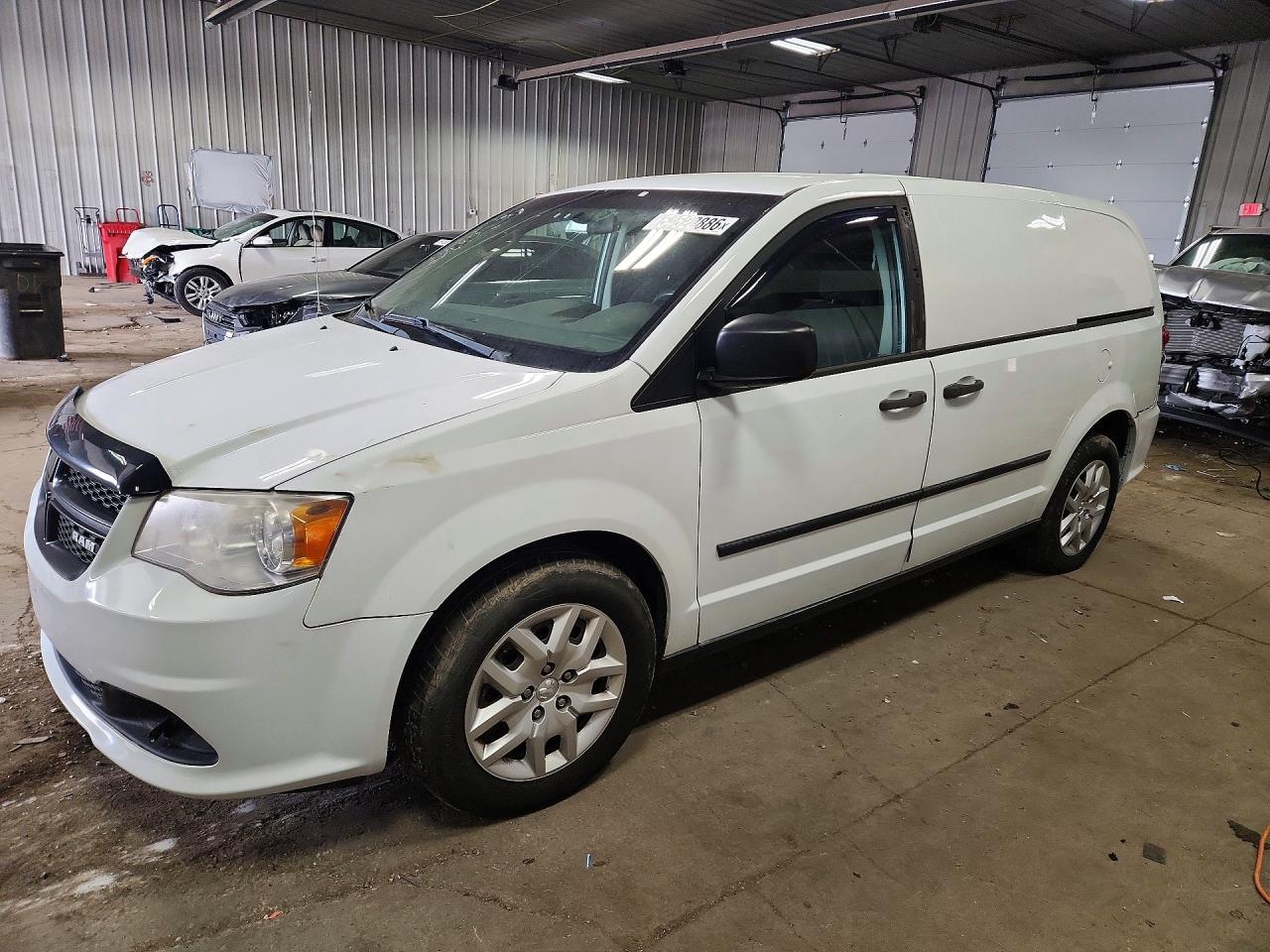 2014 Ram Cargo Van Tradesman, VIN 2C4JRGAG5ER337999 — Minor dents and scratches