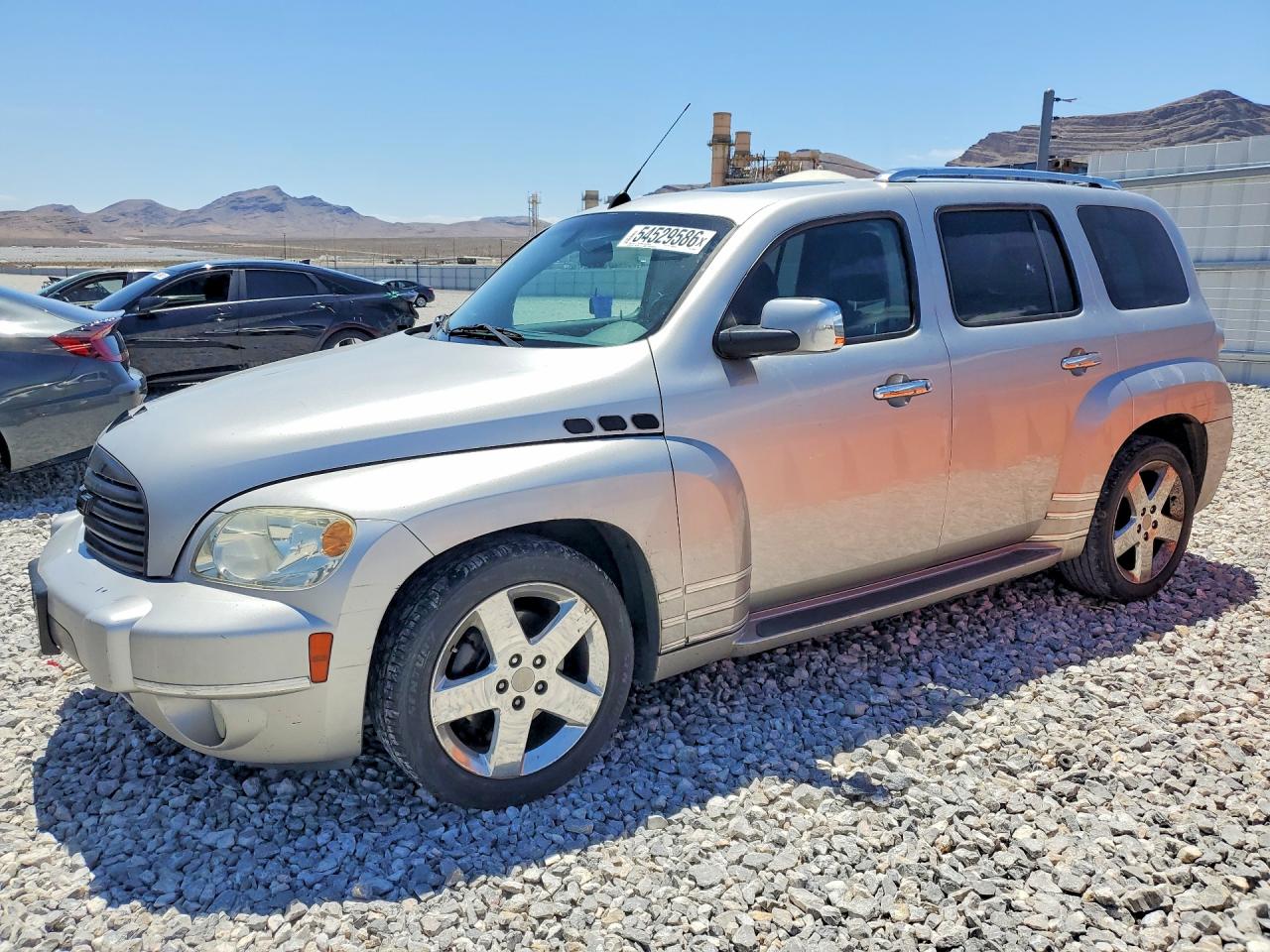 2007 Chevrolet HHR LT, VIN 3GNDA33P17S595640 — Бок
