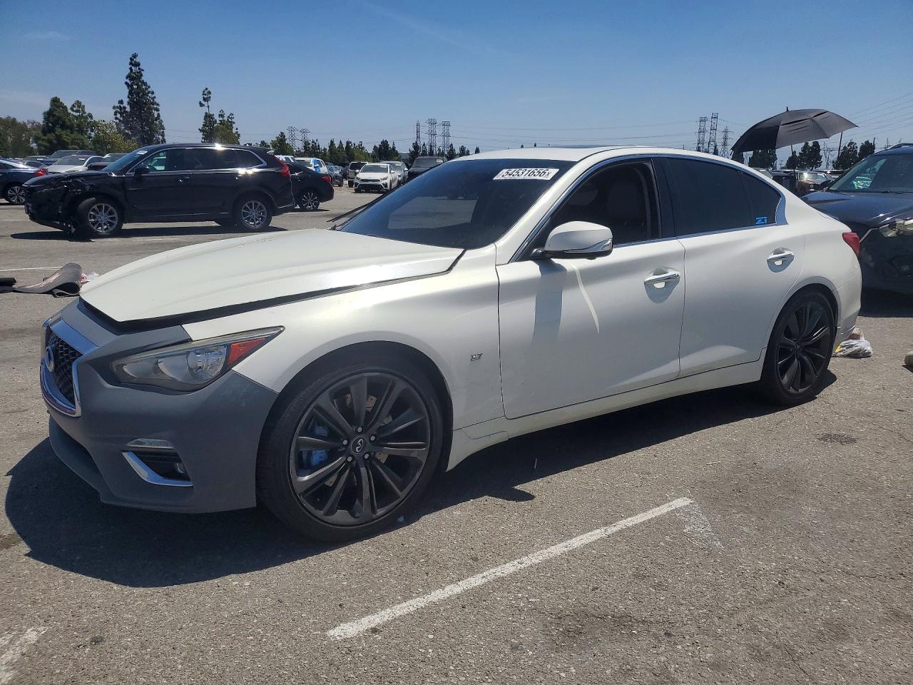 2014 Infiniti Q50 Premium, VIN JN1BV7AR3EM685193 — Side
