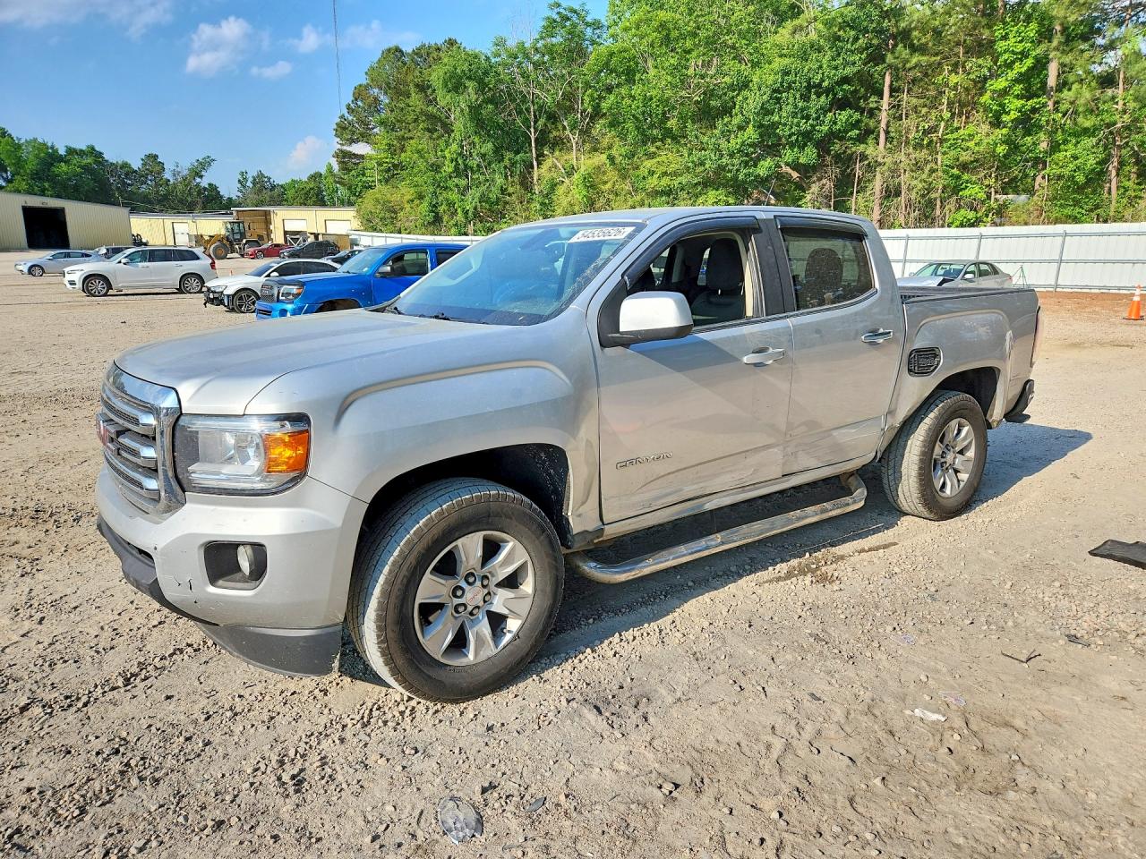 2015 GMC Canyon 2WD SLE, VIN 1GTG5BE34F1247989 — Side