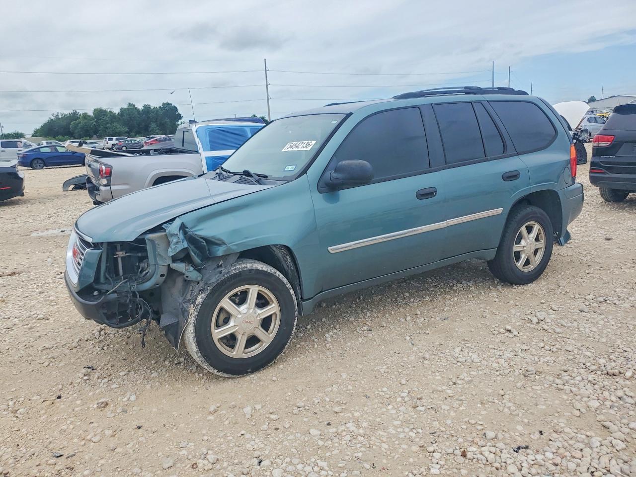 2009 GMC Envoy SLE, VIN 1GKDS33S292103338 — Front end