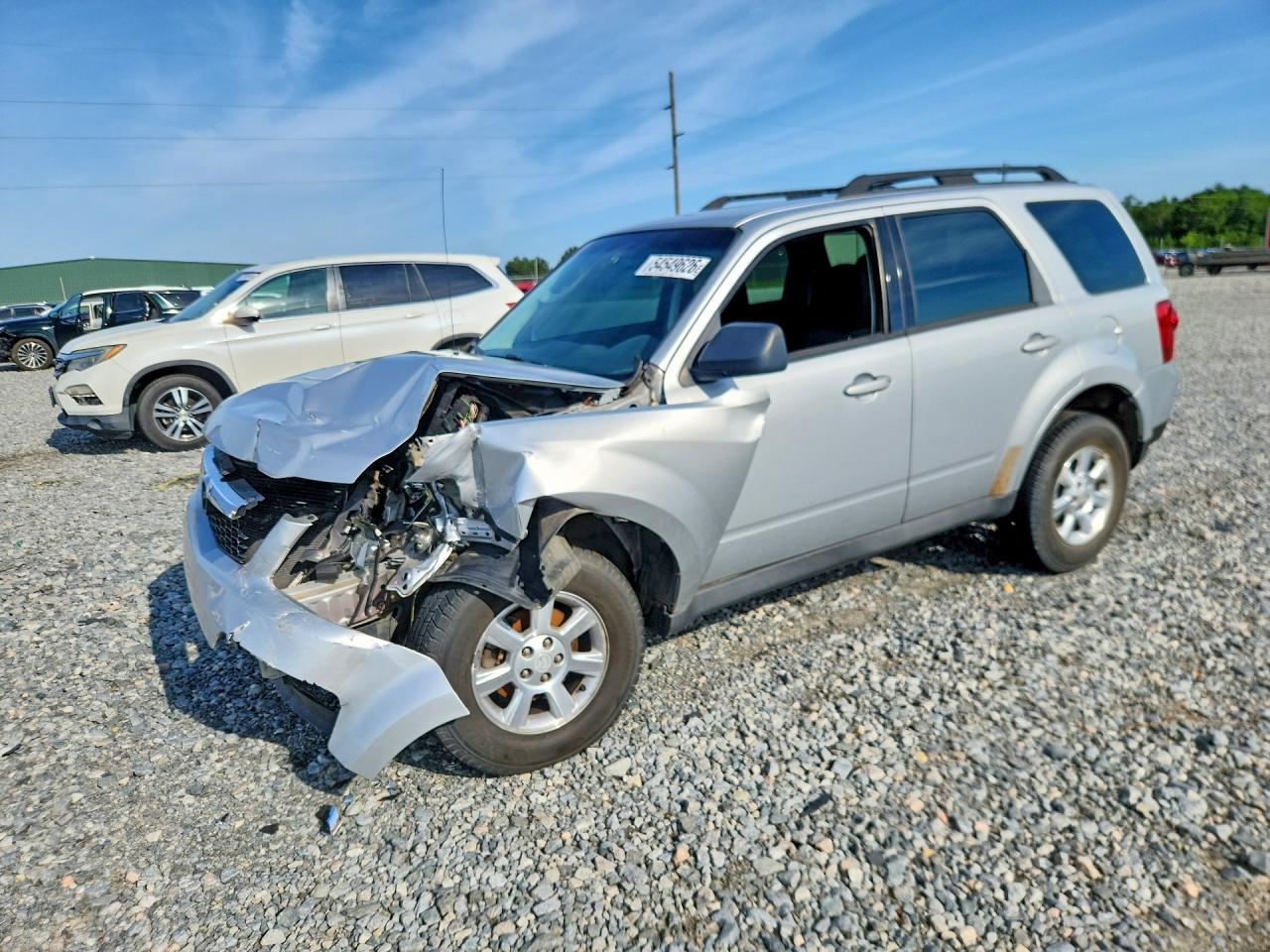 2009 Mazda Tribute Sport, VIN 4F2CZ02709KM06262 — Front end