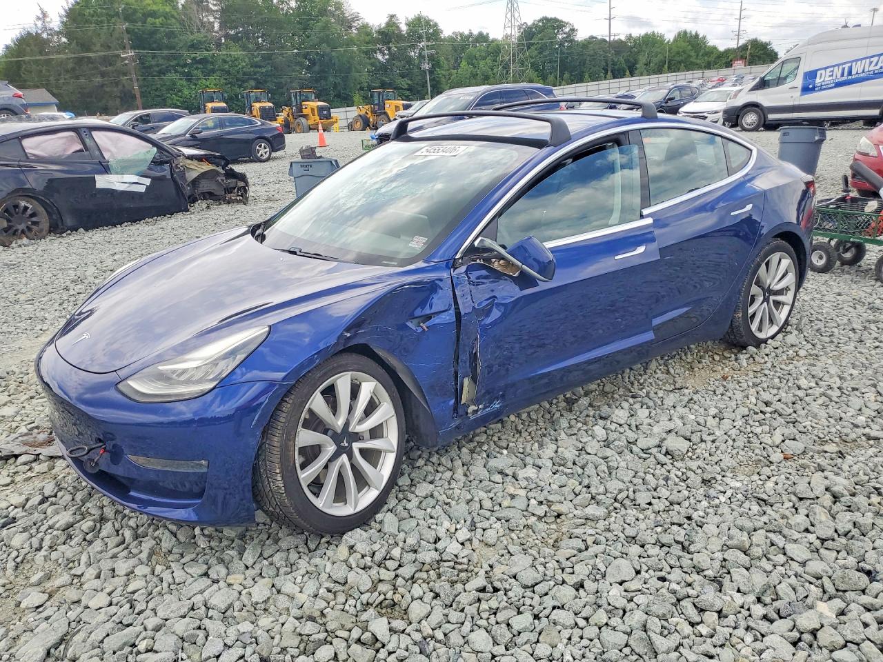 2018 Tesla Model 3 Long Range Battery, VIN 5YJ3E1EA9JF042823 — Side