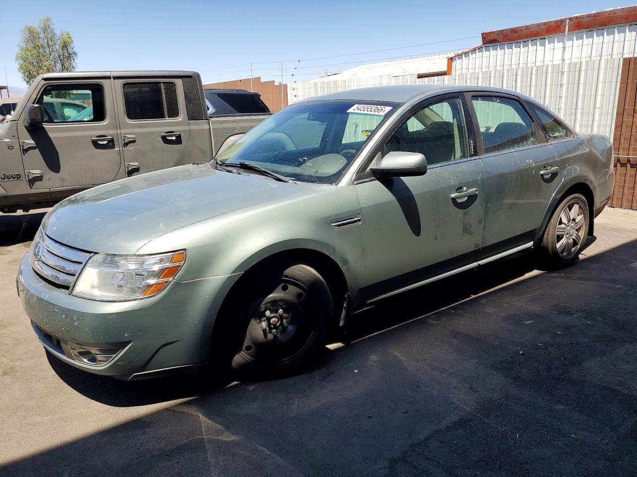2008 Ford Taurus SEL, VIN 1FAHP24W08G156122 — Зад