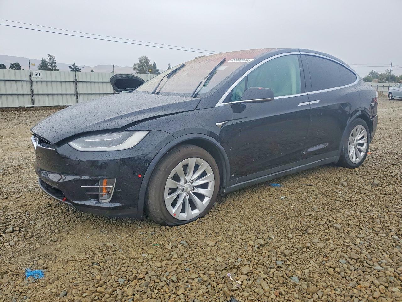 2017 Tesla Model X 90D, VIN 5YJXCAE24HF060222 — Rear end