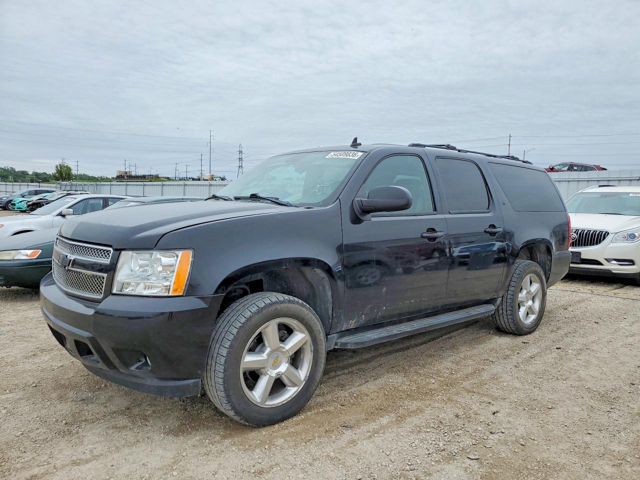 2010 Chevrolet Suburban LT, VIN 1GNUKJE32AR209457 — Град