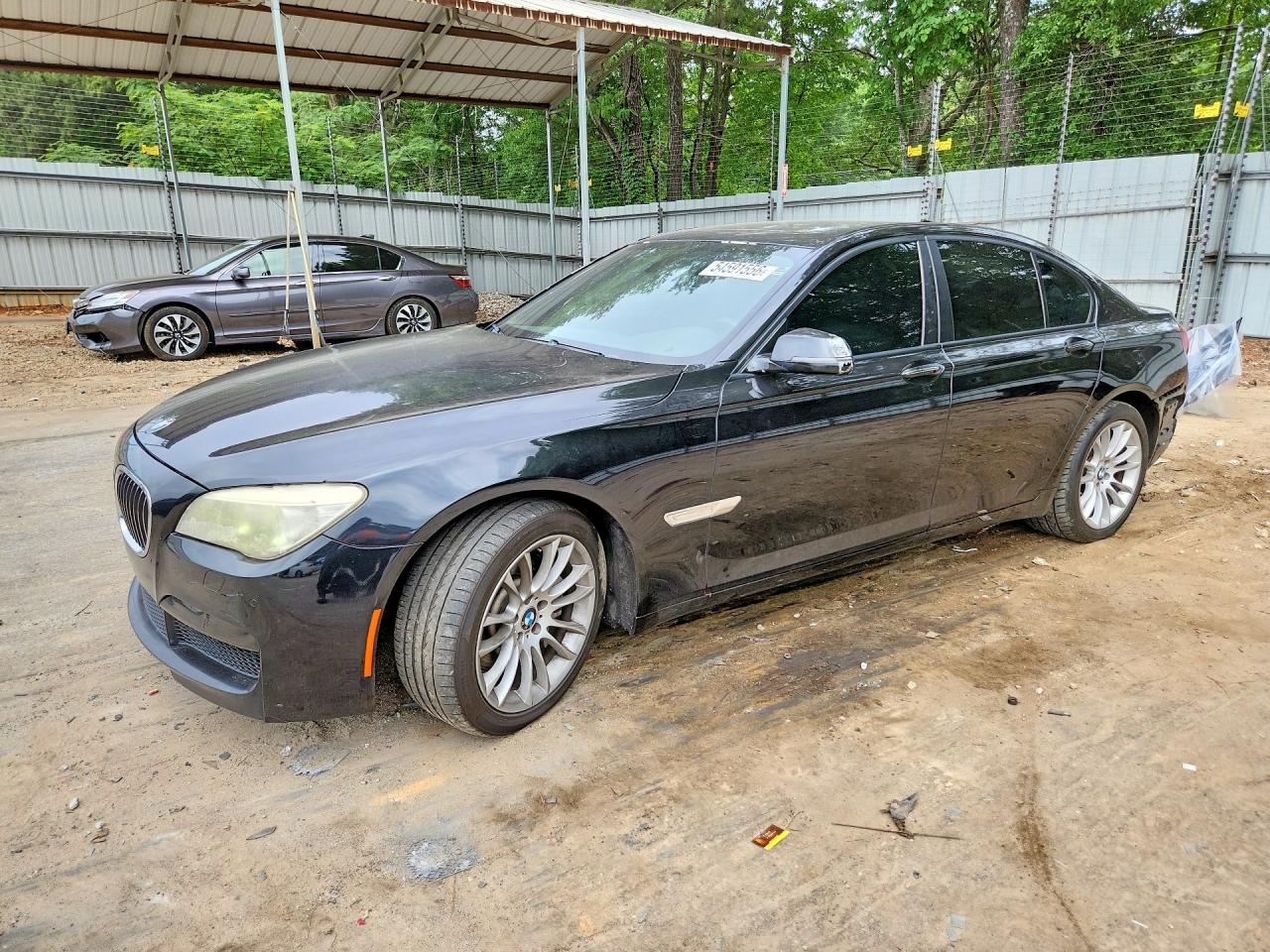 2013 BMW 7 Series 750i, VIN WBAYA8C59DD227835 — Rear end