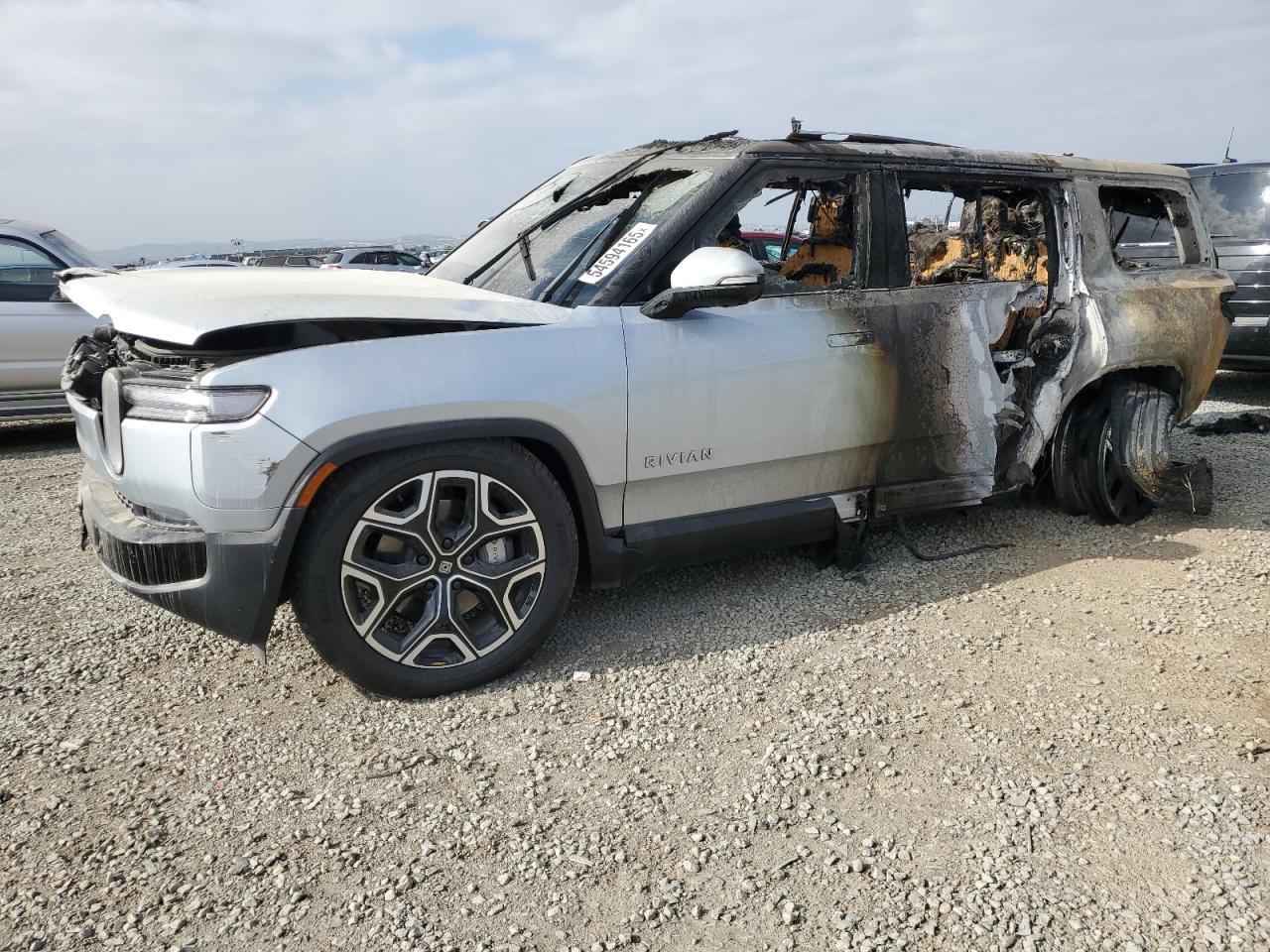 2025 Rivian R1S Adventure, VIN 7PDSGBBA3SN058186 — Burn
