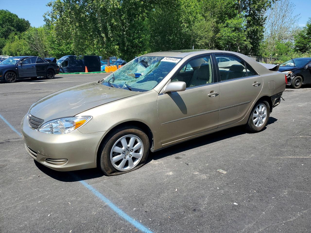 2002 Toyota Camry XLE, VIN JTDBE32K520098794 — Rear end
