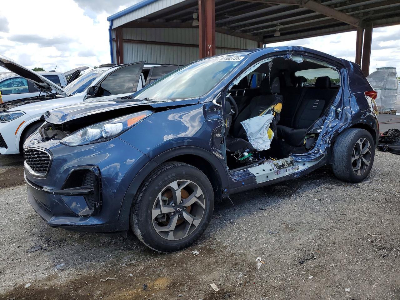 2020 Kia Sportage LX, VIN KNDPM3AC6L7793975 — Бок