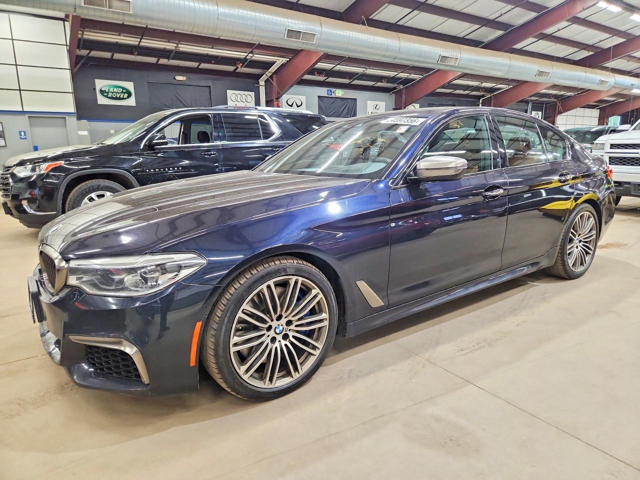 2018 BMW 5 Series M550i xDrive, VIN WBAJB9C52JB035796 — Minor dents and scratches