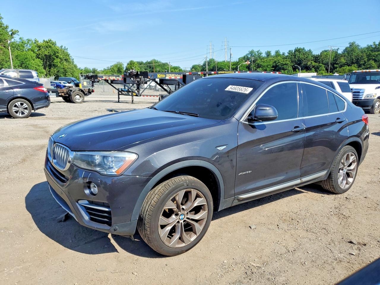 2018 BMW X4 xDrive28i, VIN 5UXXW3C51J0T80942 — Бок