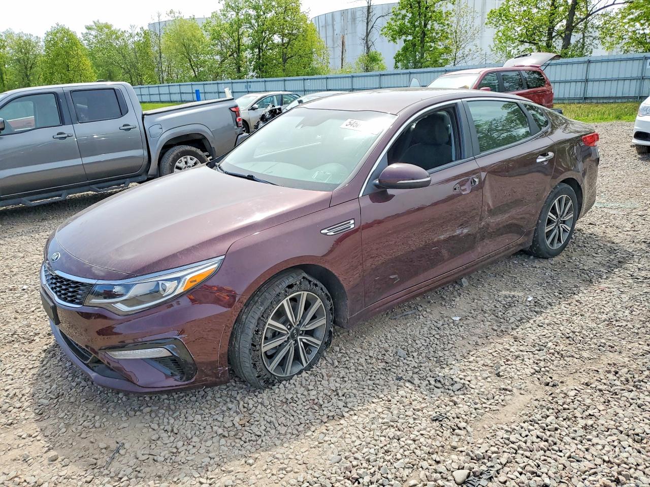 2019 Kia Optima LX, VIN 5XXGT4L3XKG358839 — Side