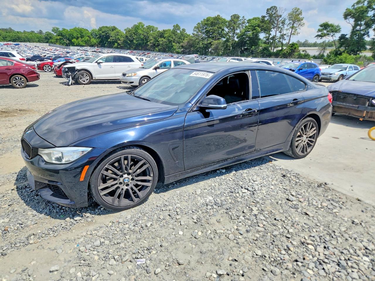 2015 BMW 4 Series 428i, VIN WBA4A9C52FGL86119 — Side