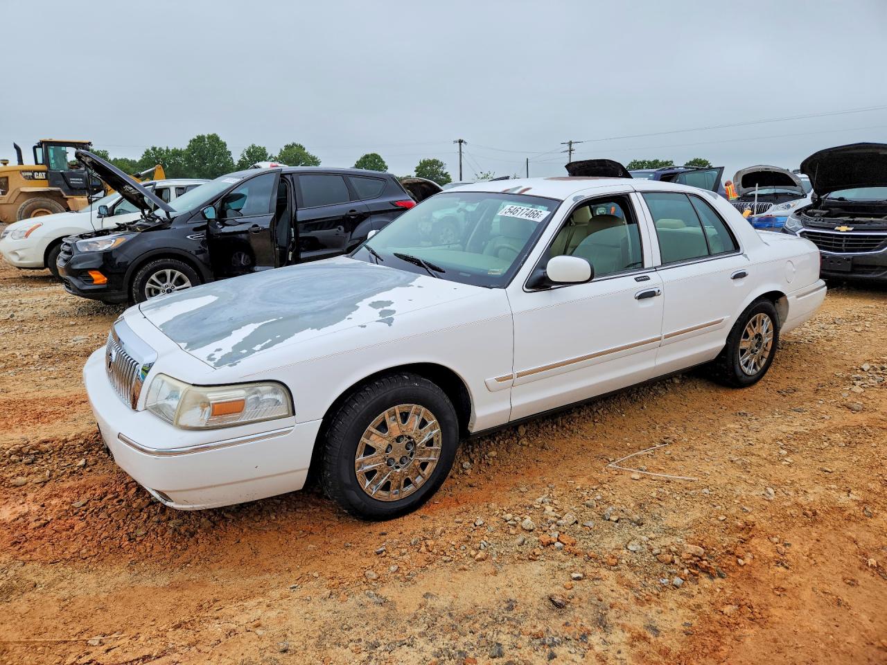 2006 Mercury Grand Marquis GS, VIN 2MEFM74V36X649779 — Hail
