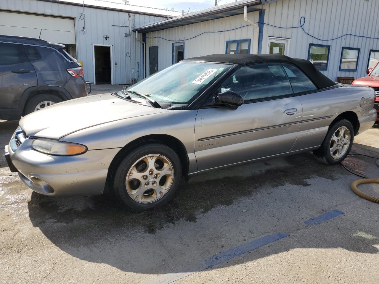 1998 Chrysler Sebring JXi, VIN 3C3EL55H7WT202665 — Бок