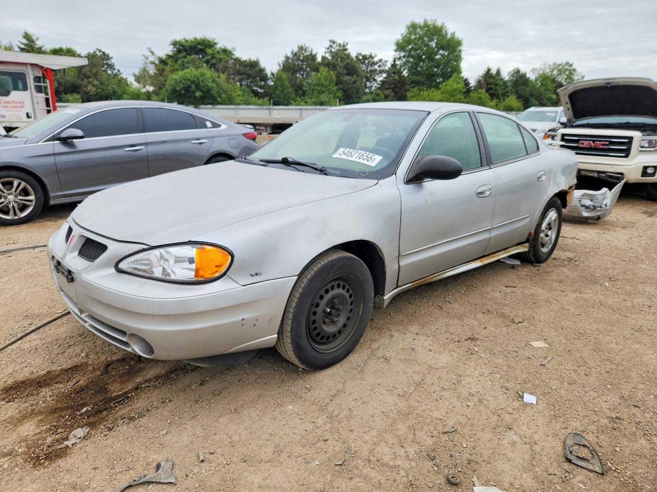 2005 Pontiac Grand Am SE, VIN 1G2NE52E85M192348 — Side