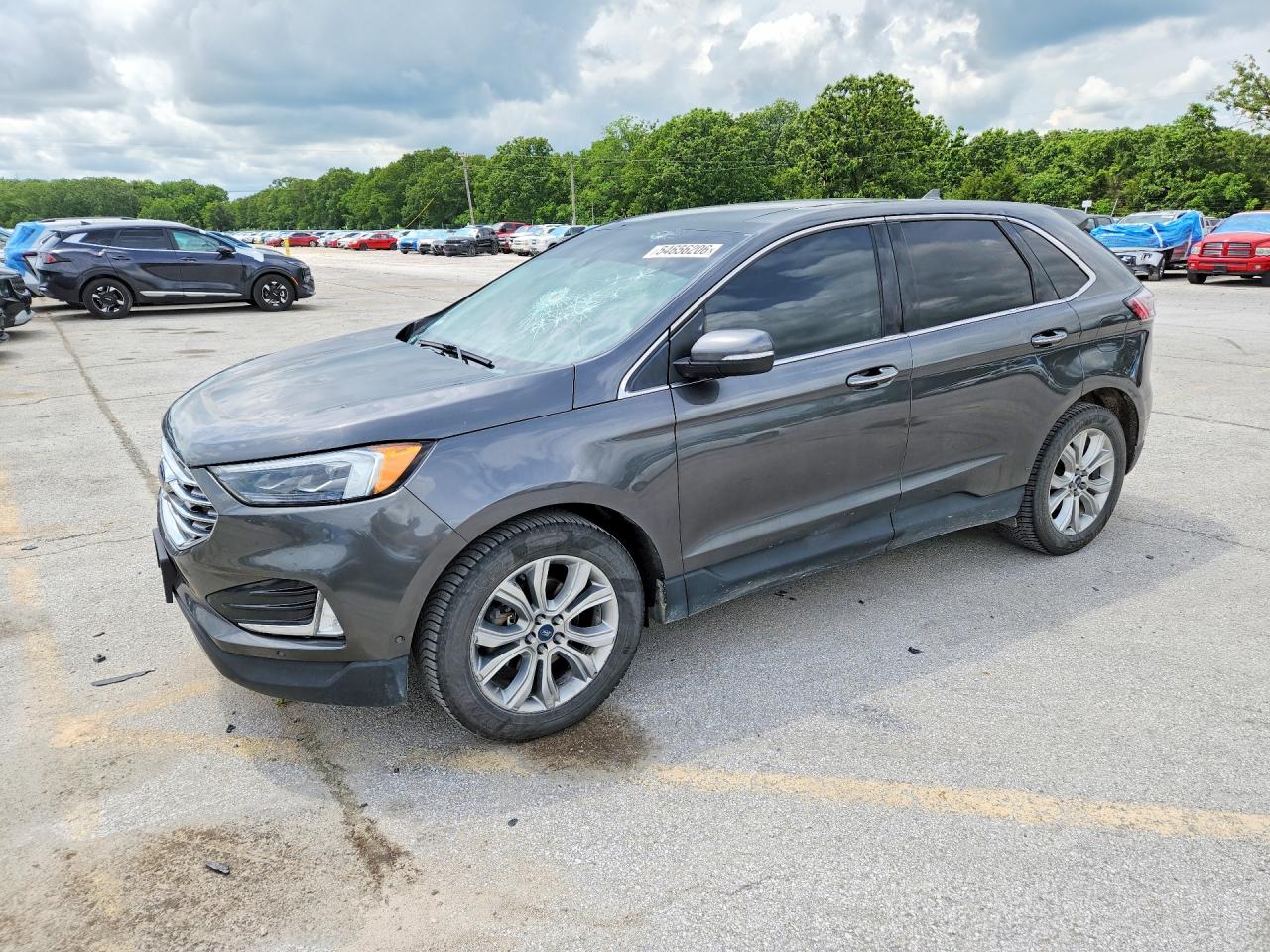 2019 Ford Edge Titanium, VIN 2FMPK3K99KBB42706 — Hail