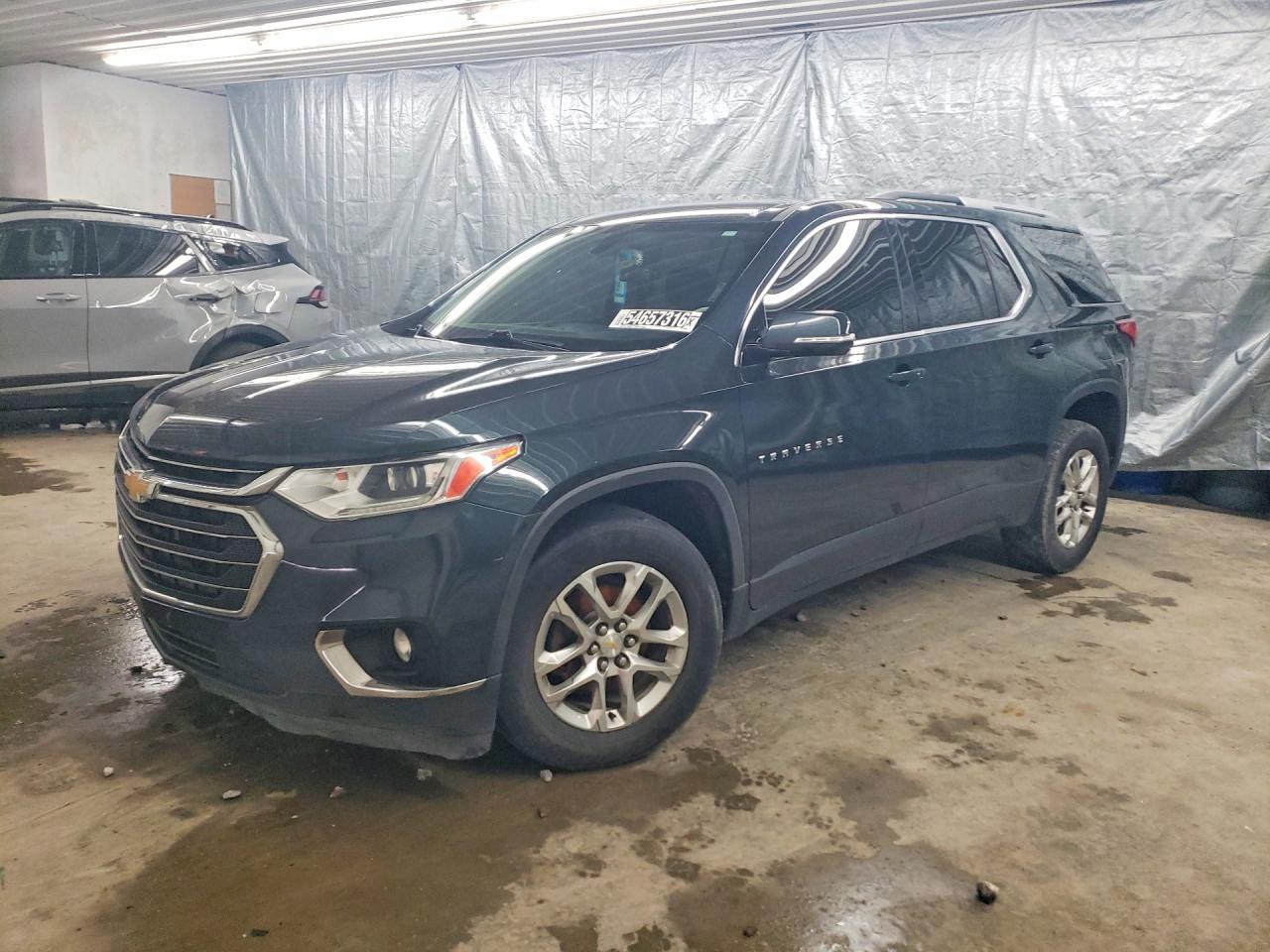 2018 Chevrolet Traverse LT Cloth, VIN 1GNERGKWXJJ169452 — Rear end