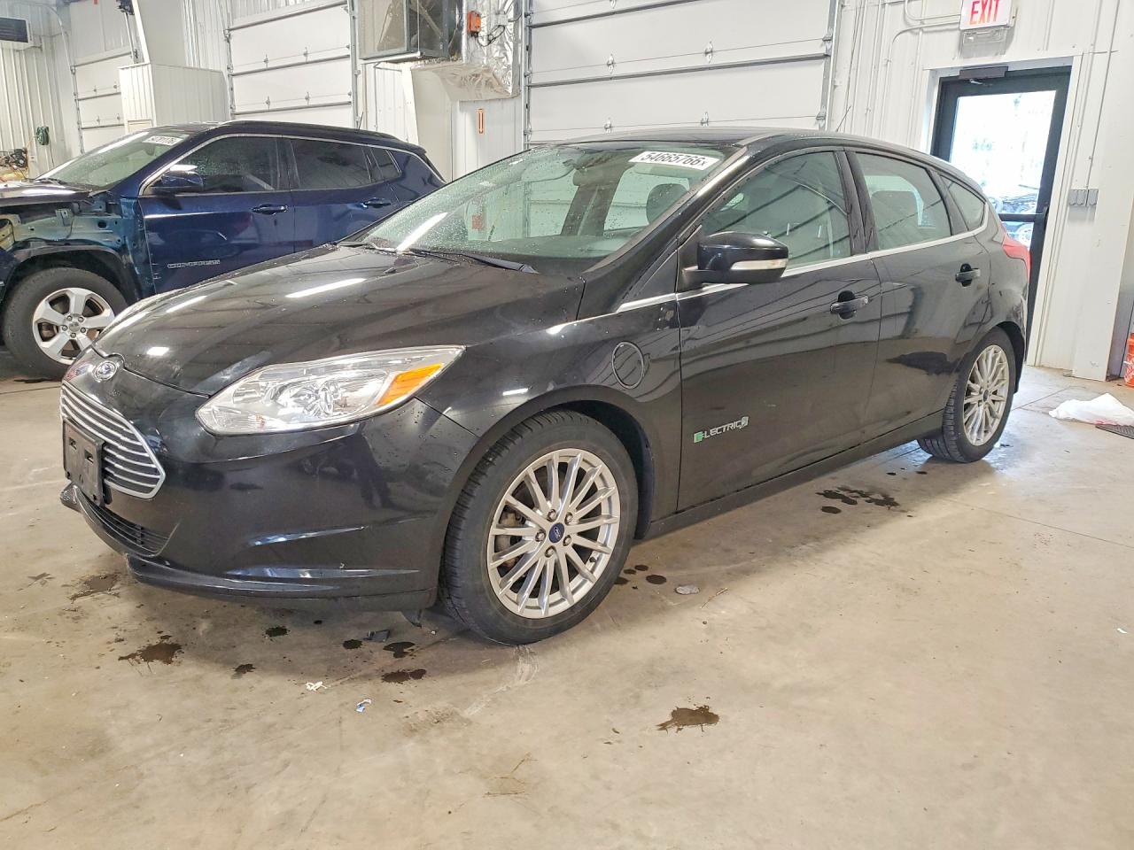 2014 Ford Focus Electric, VIN 1FADP3R42EL123511 — Undercarriage