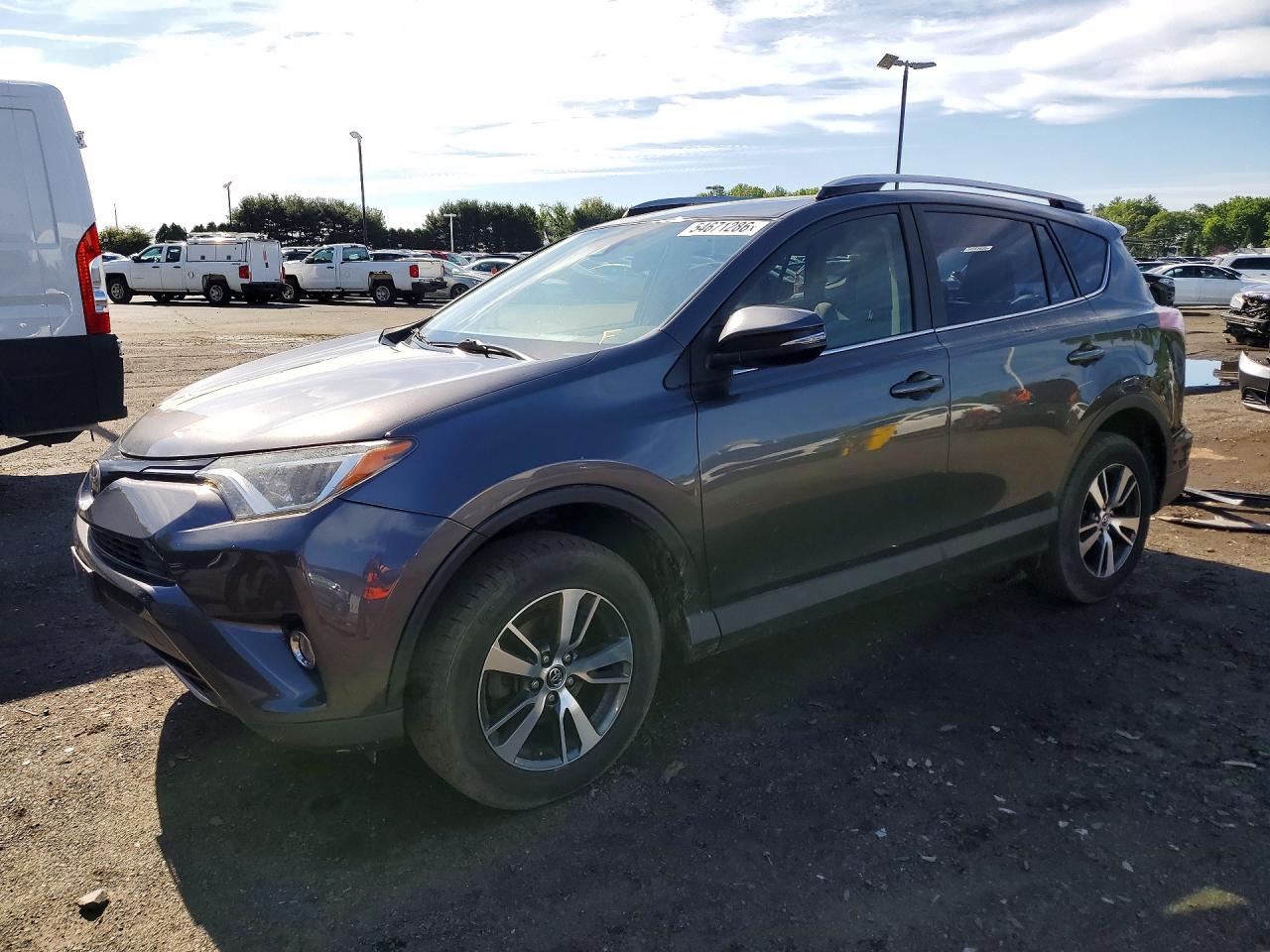2018 Toyota RAV4 XLE, VIN JTMRFREV7JJ723239 — Rear end