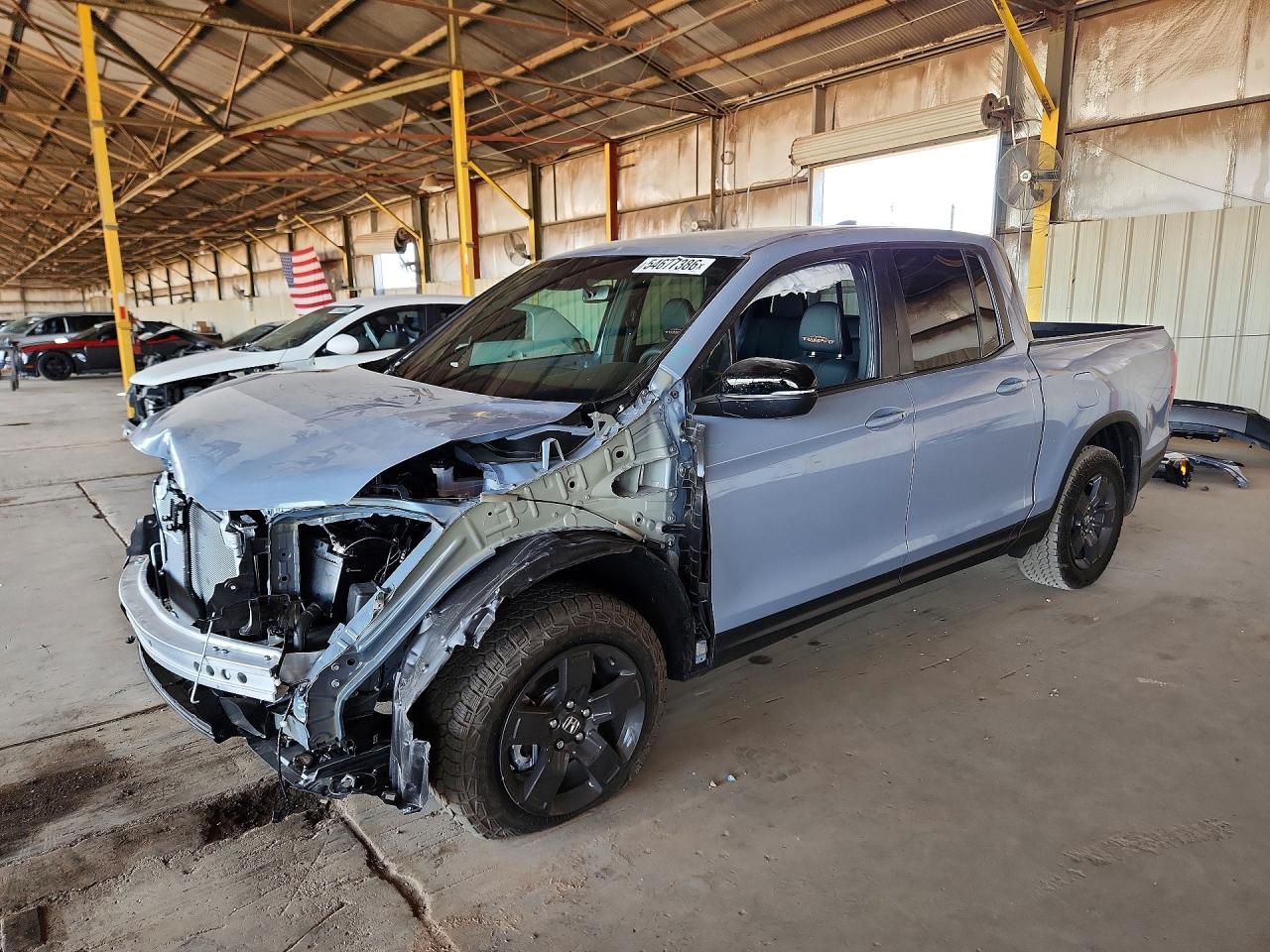 2026 Honda Ridgeline TrailSport, VIN 5FPYK3F67TB029583 — Front end