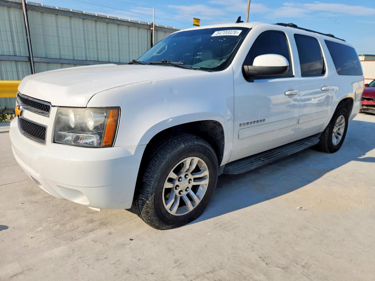 2014 Chevrolet Suburban LT, VIN 1GNSCJE03ER234688 — Hail
