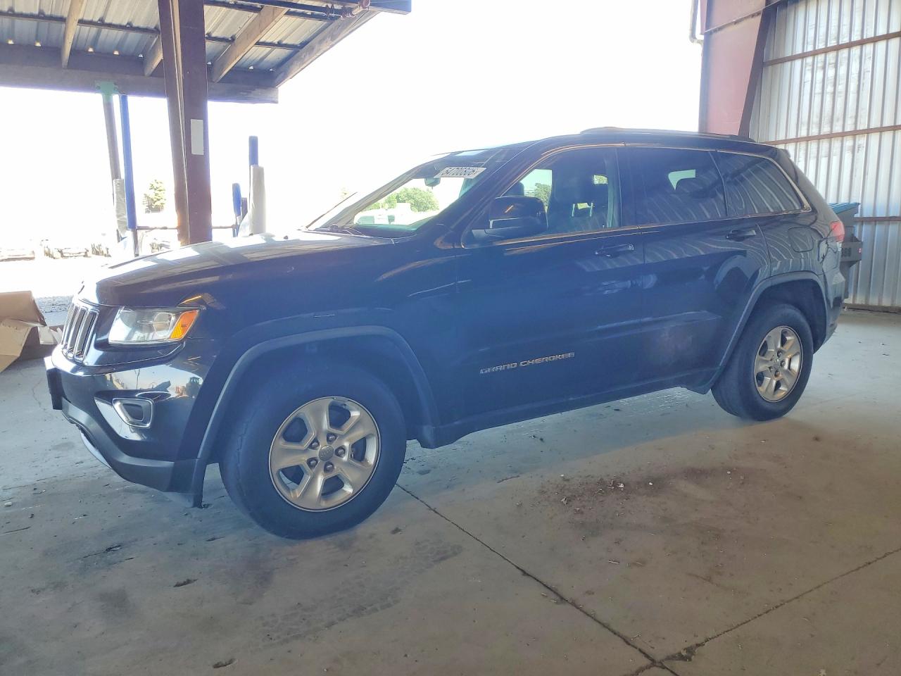 2016 Jeep Grand Cherokee Laredo, VIN 1C4RJEAG4GC457691 — Minor dents and scratches