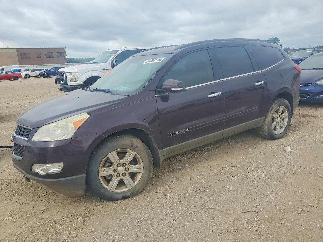 2009 Chevrolet Traverse 2LT, VIN 1GNEV23DX9S139241 — Hail