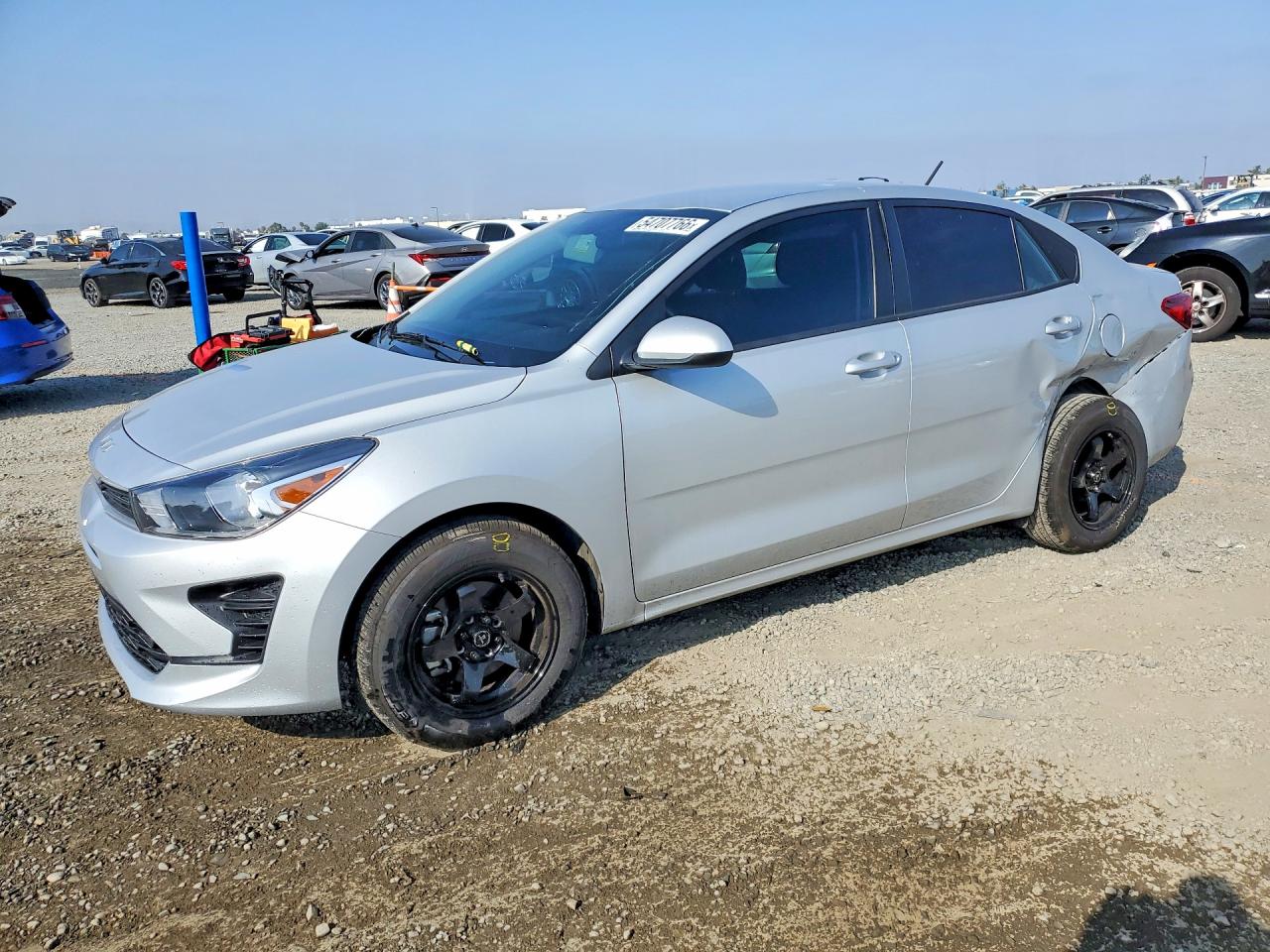 2023 Kia Rio LX, VIN 3KPA24AD7PE576094 — Side