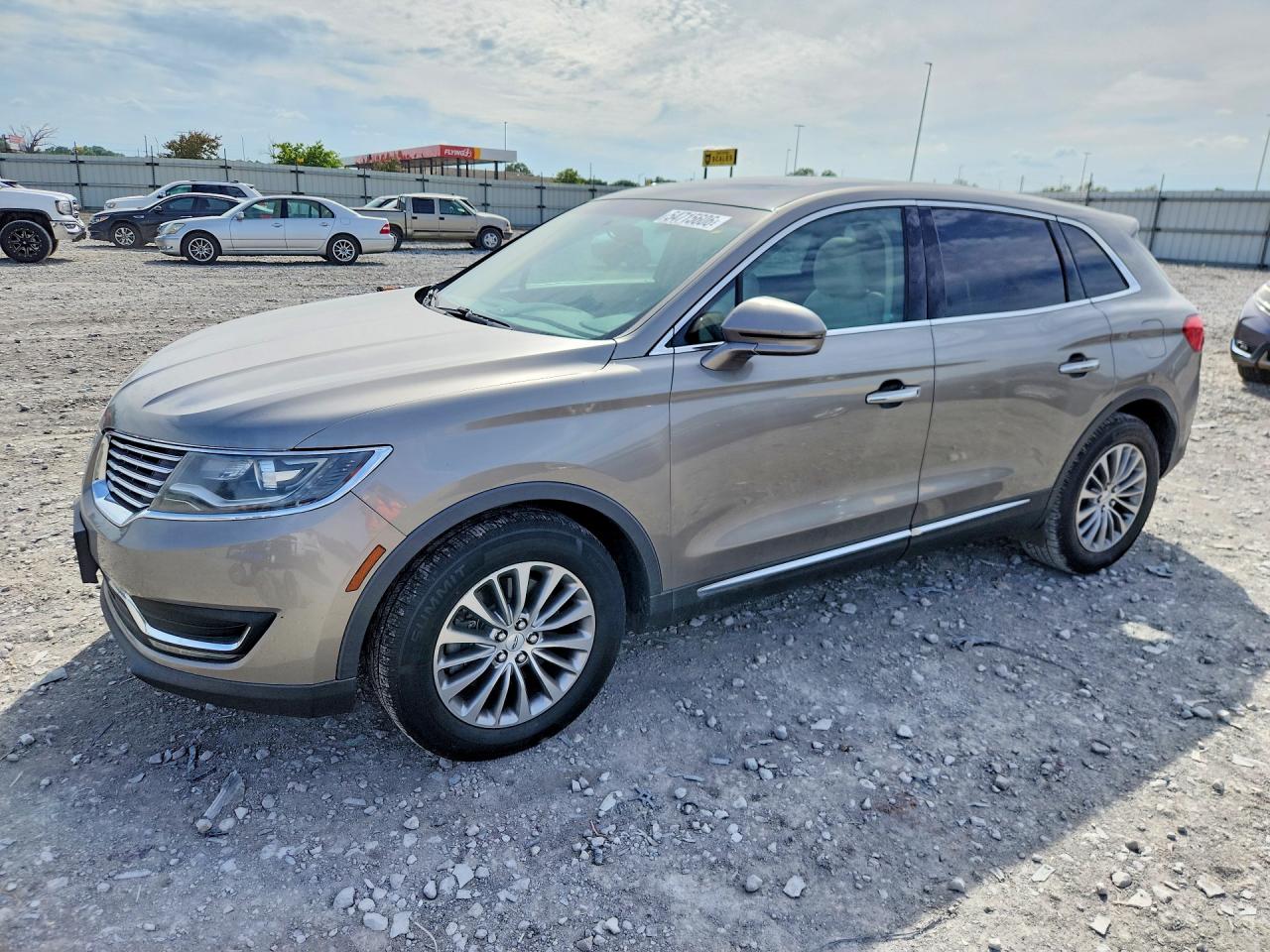 2016 Lincoln MKX Select, VIN 2LMTJ6KP3GBL27959 — Мелкие вмятины и царапины