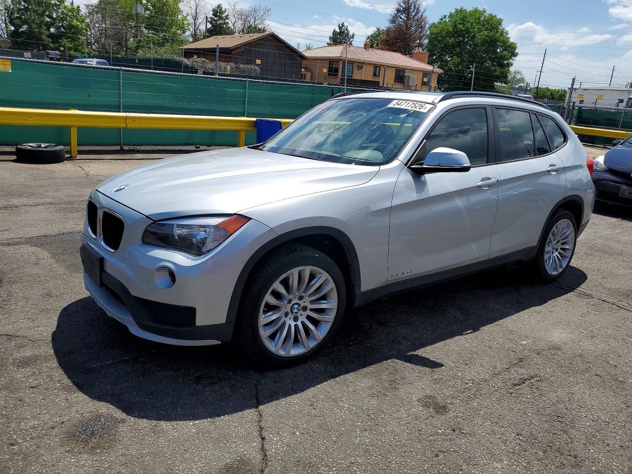 2015 BMW X1 sDrive28i, VIN WBAVM1C5XFV497798 — Minor dents and scratches