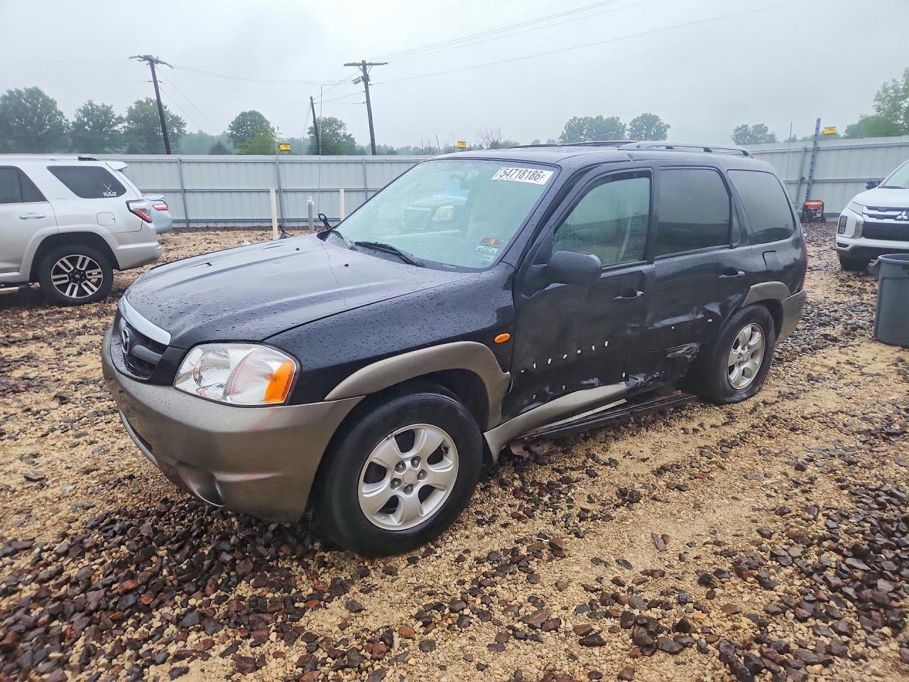 2004 Mazda Tribute LX, VIN 4F2YZ94174KM02589 — Side