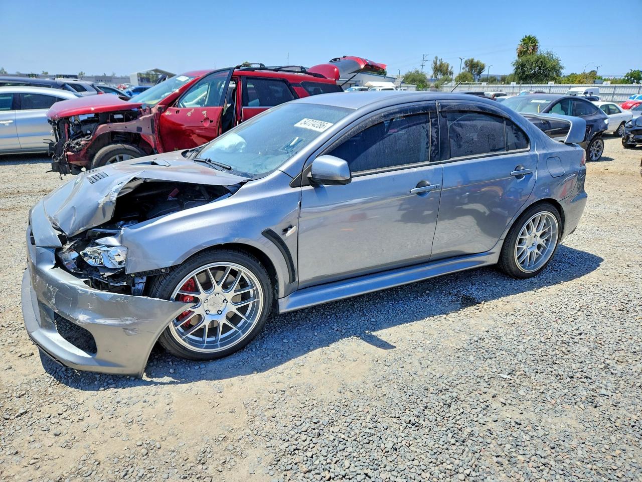 2014 Mitsubishi Lancer Evolution GSR, VIN JA32W8FVXEU021722 — Перед