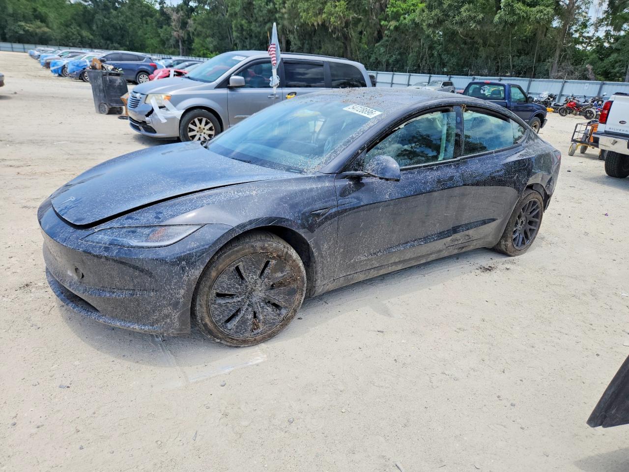2025 Tesla Model 3 Long Range, VIN 5YJ3E1EA5SF987947 — Rollover