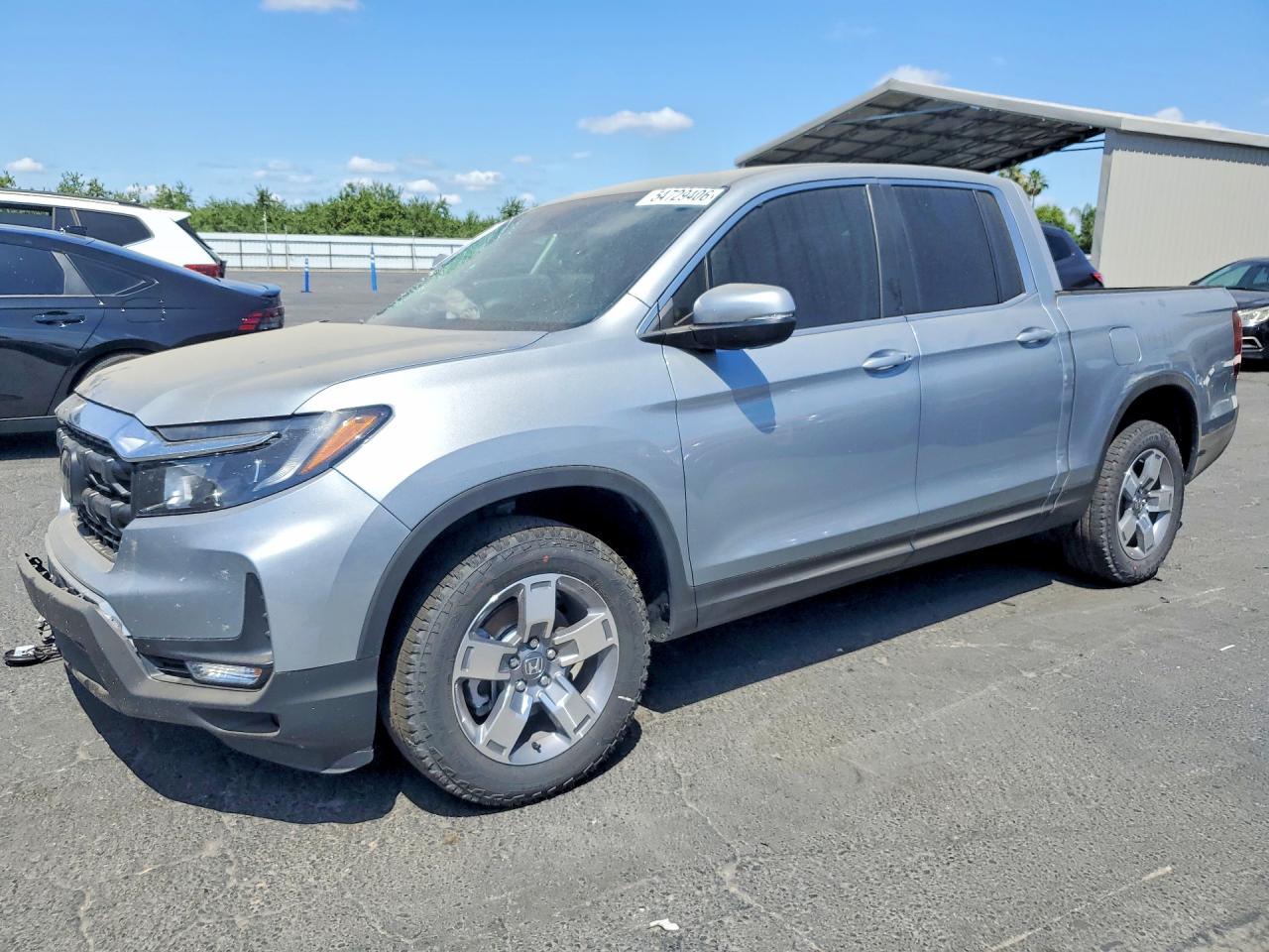 2026 Honda Ridgeline RTL, VIN 5FPYK3F54TB011484 — Front end