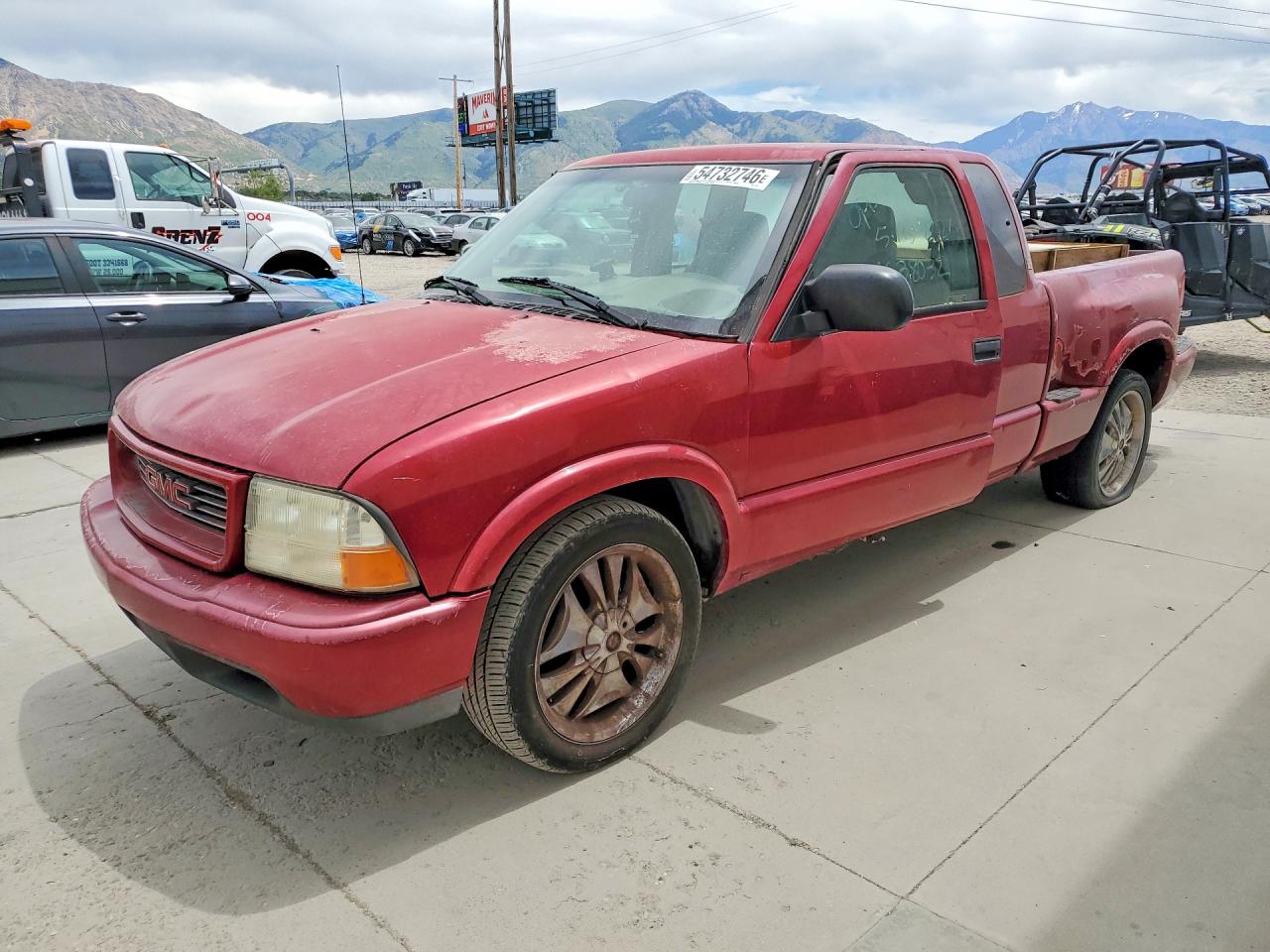 2000 GMC Sonoma SLS, VIN 1GTCS1942Y8110774 — Side