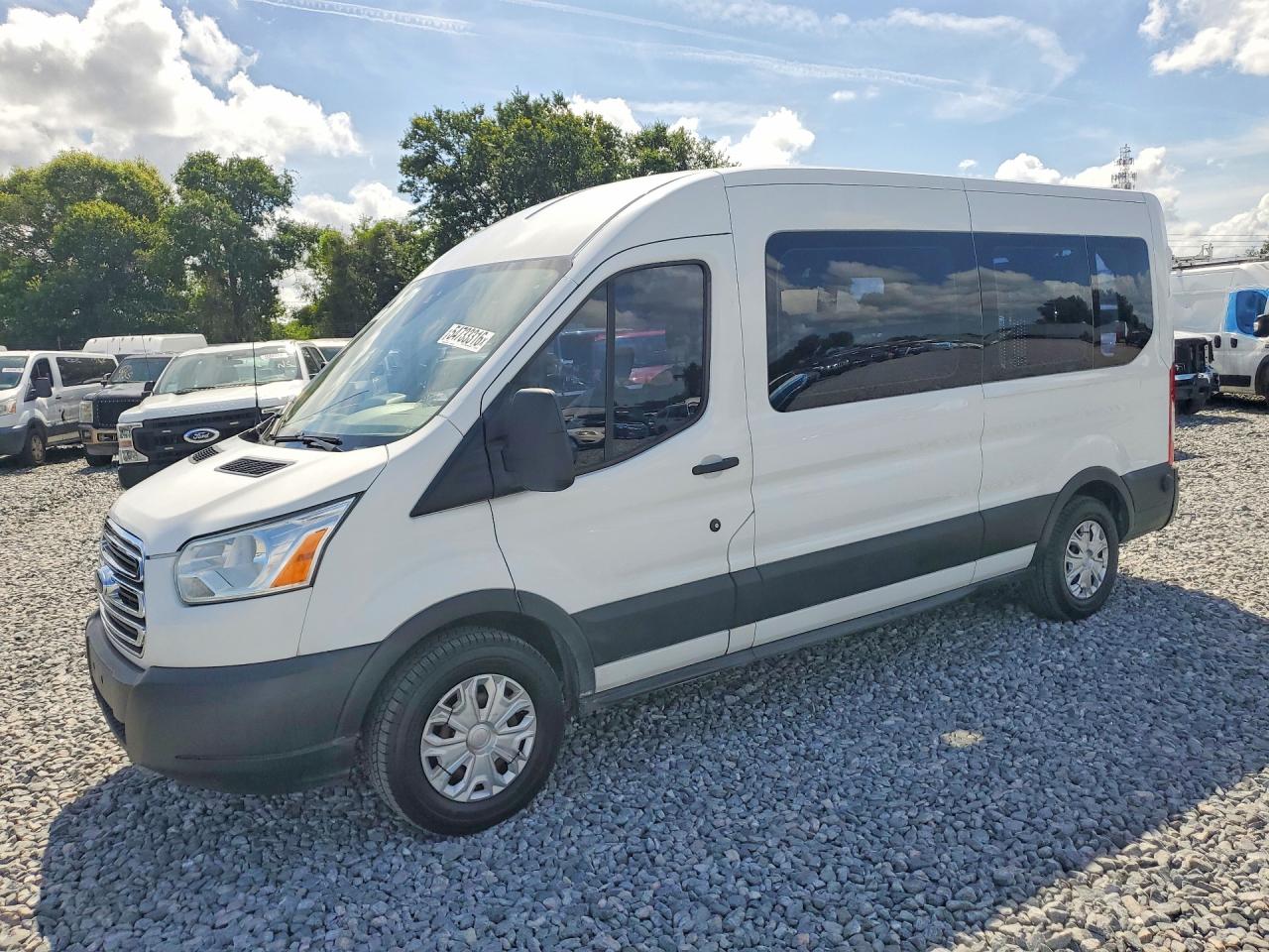 2019 Ford Transit Passenger XL, VIN 1FBAX2CMXKKB65012 — Side