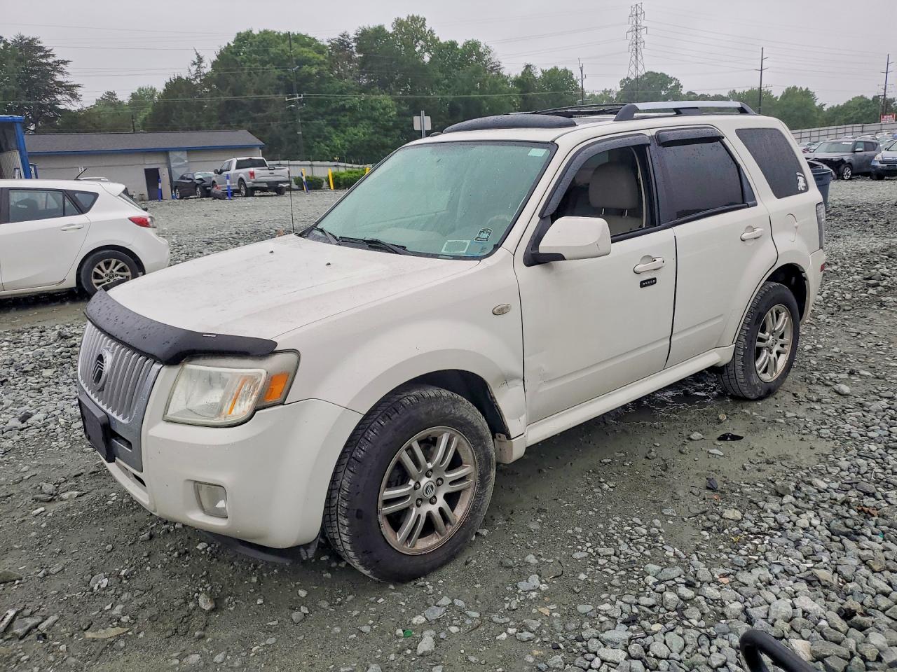 2009 Mercury Mariner Premier, VIN 4M2CU97G89KJ19029 — Minor dents and scratches